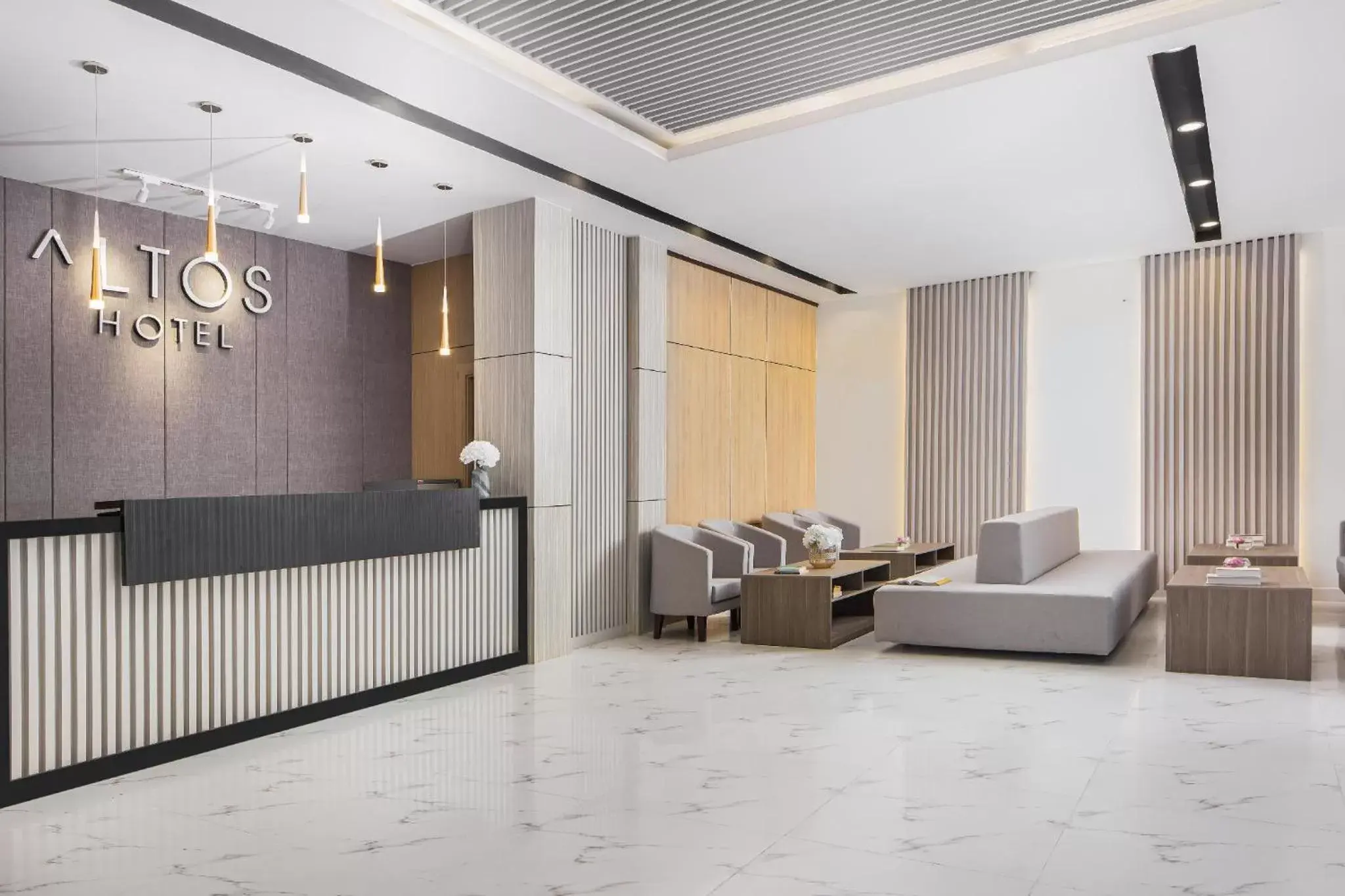 Lobby or reception in Altos Hotel