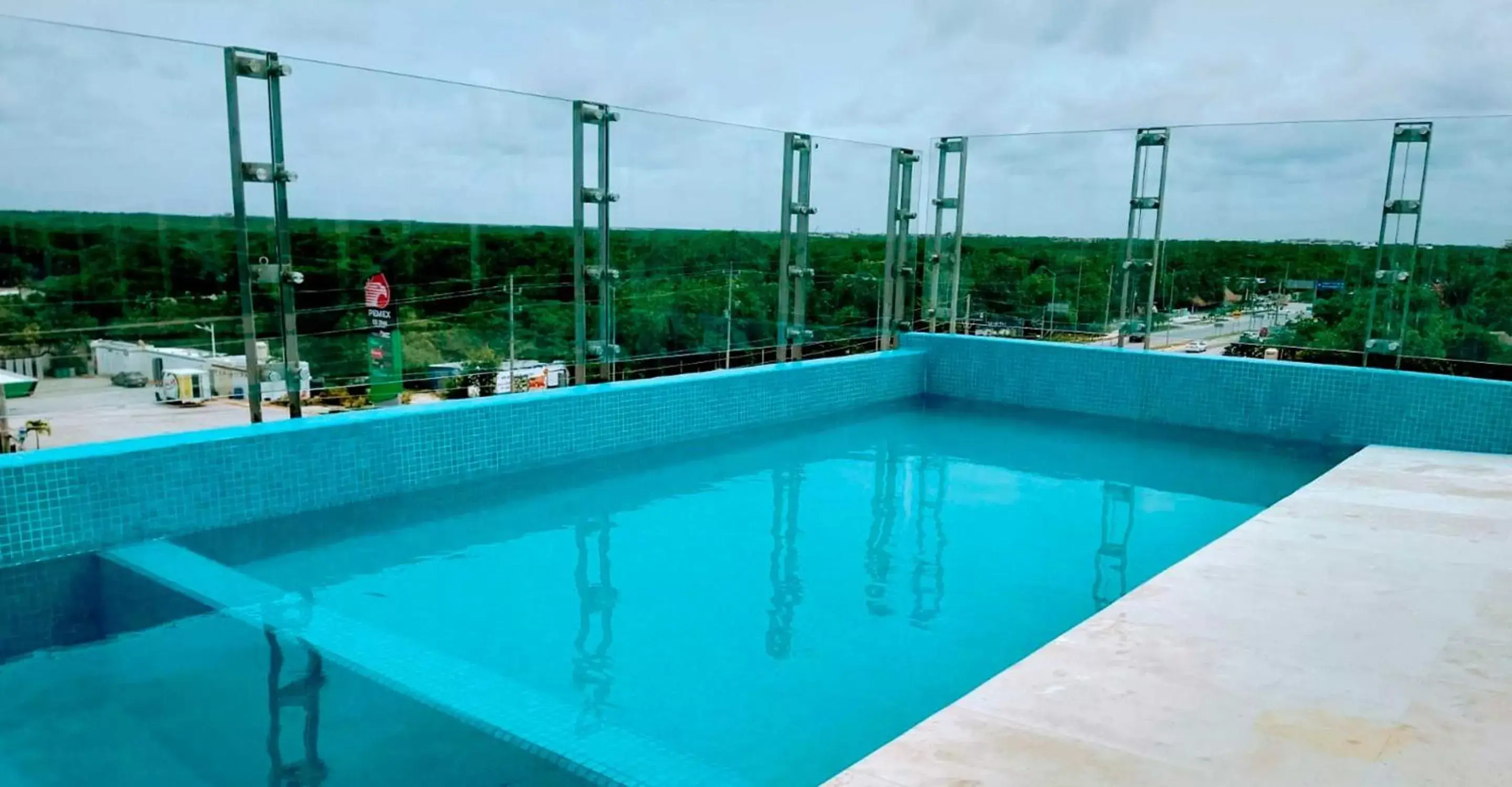 Swimming pool in Siente Tulum Hotel & Cenote Club Swimming pool in Siente Tulum Hotel & Cenote Club