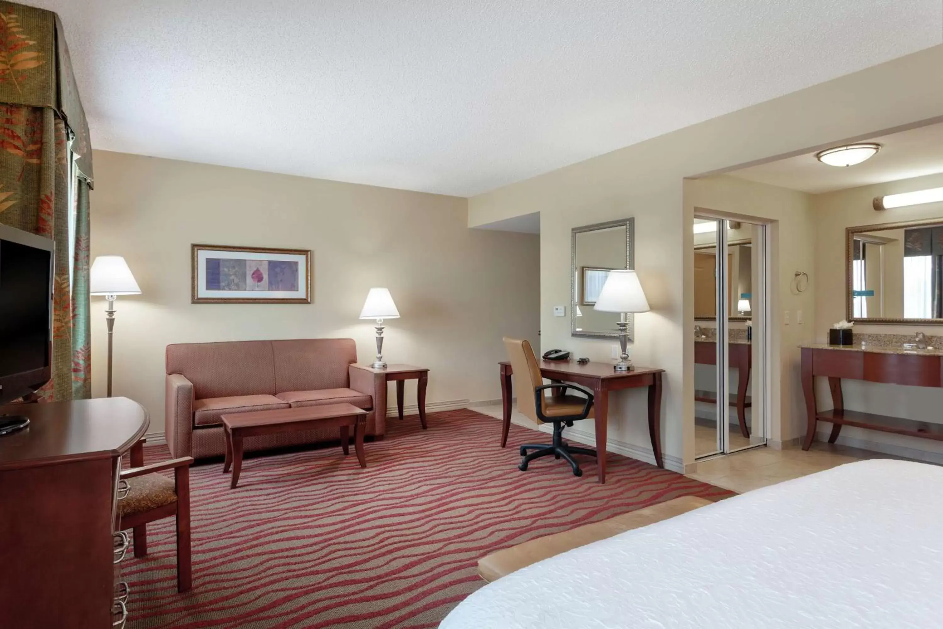 Bedroom, Seating Area in Hampton Inn & Suites Port Richey