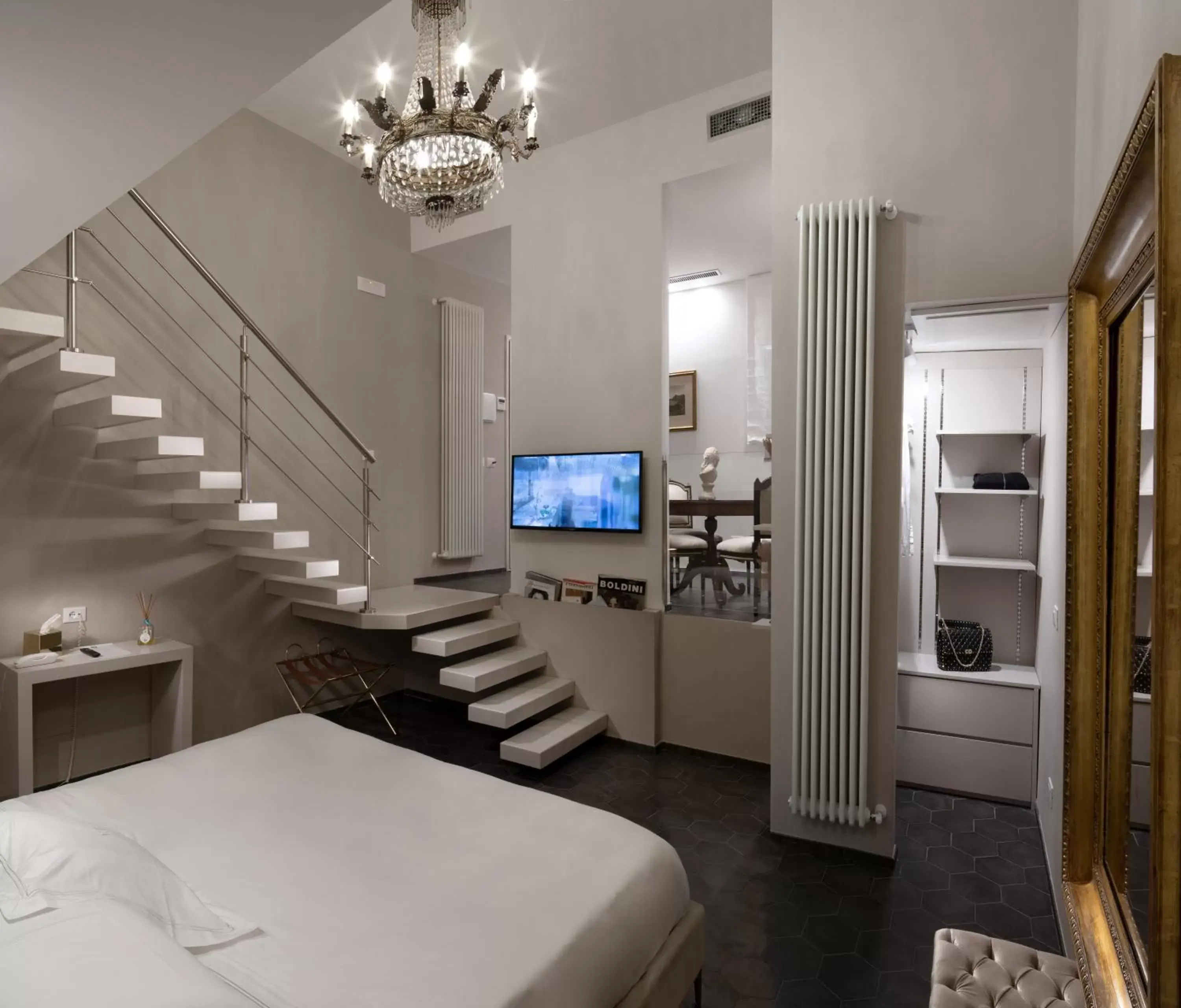 Photo of the whole room, TV/Entertainment Center in Hotel Villa Taormina