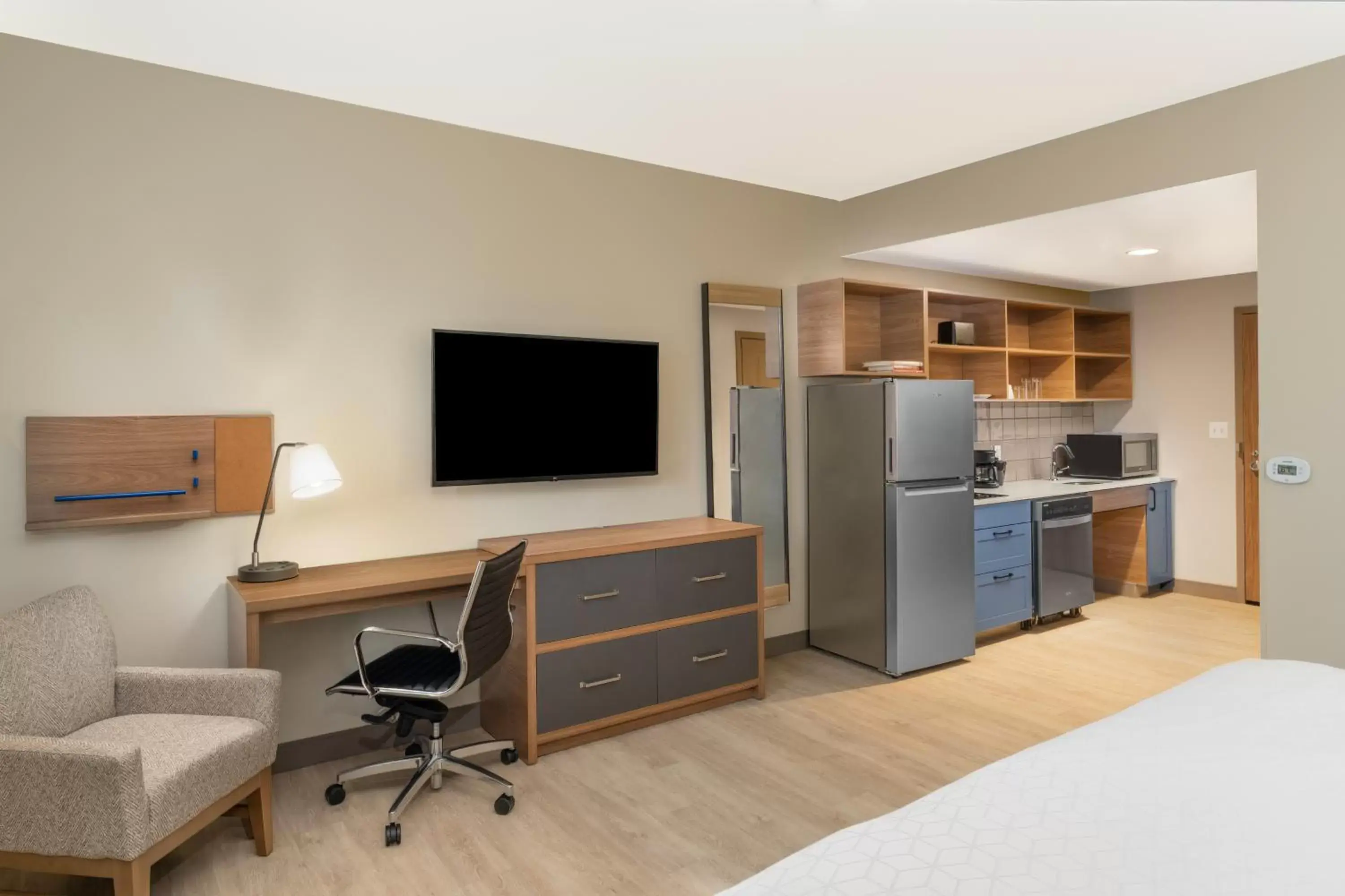 Bedroom, TV/Entertainment Center in Candlewood Suites - Asheville Downtown, an IHG Hotel