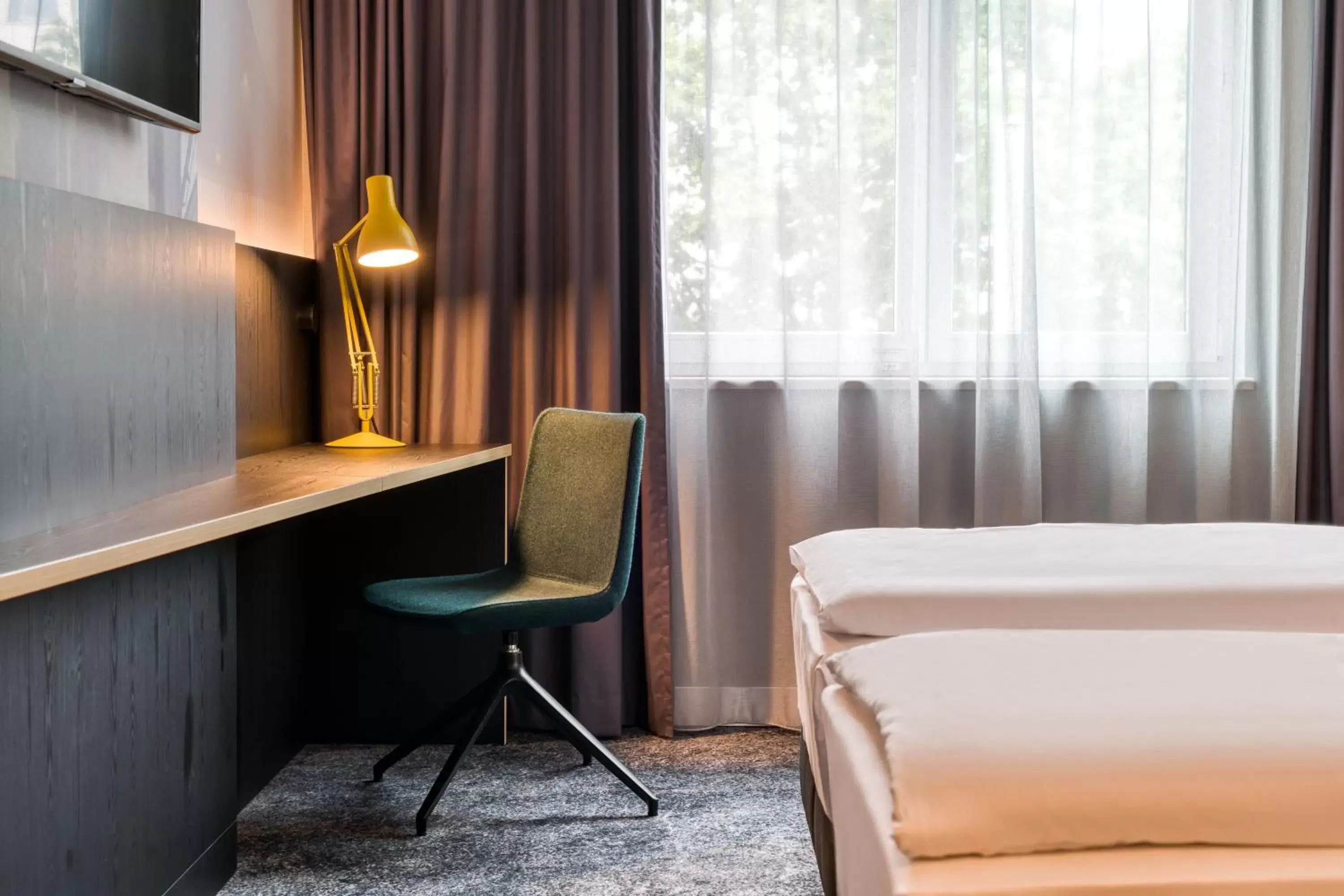 Seating area, Bed in Mercure Neu-Isenburg