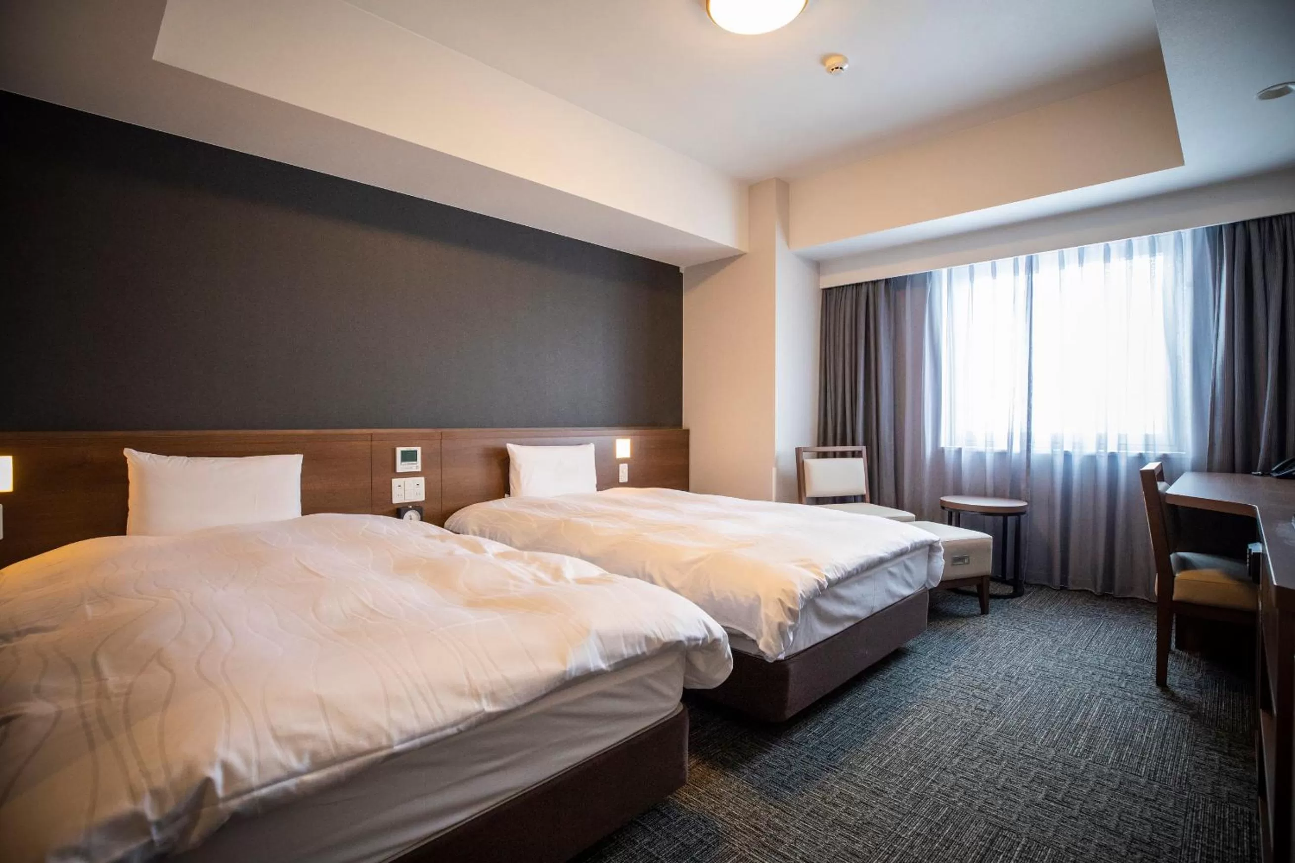 Bed in La Vista Furano Hills Natural Hot Spring