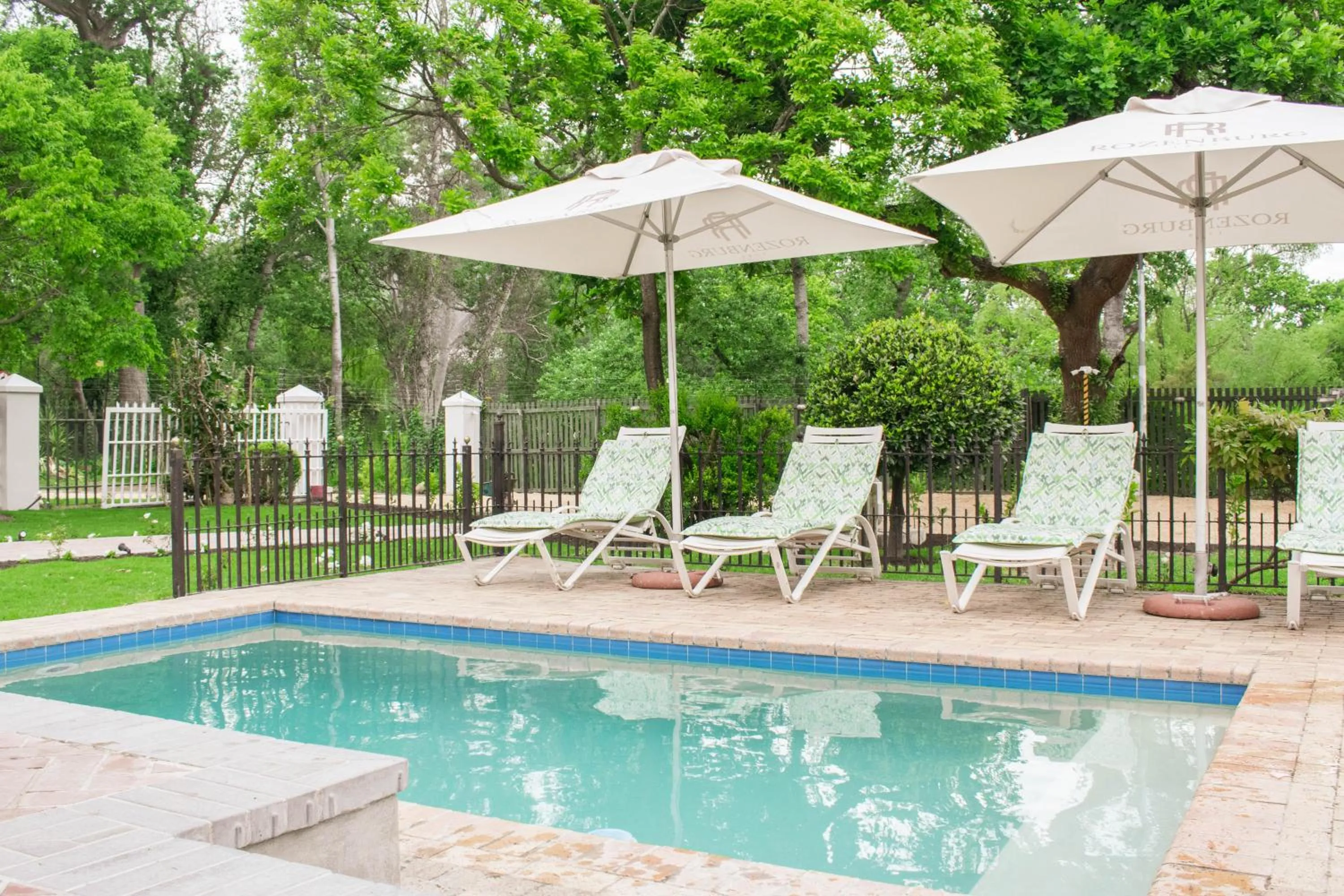 Pool view in Rozenburg Guest House
