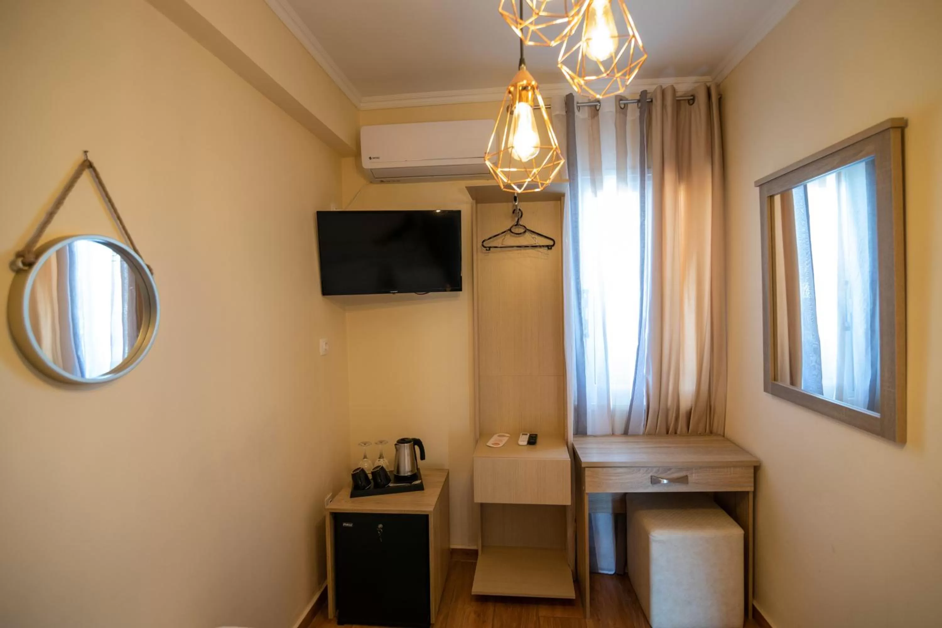 TV and multimedia in Votsalakia Hotel & Luxury Apartments