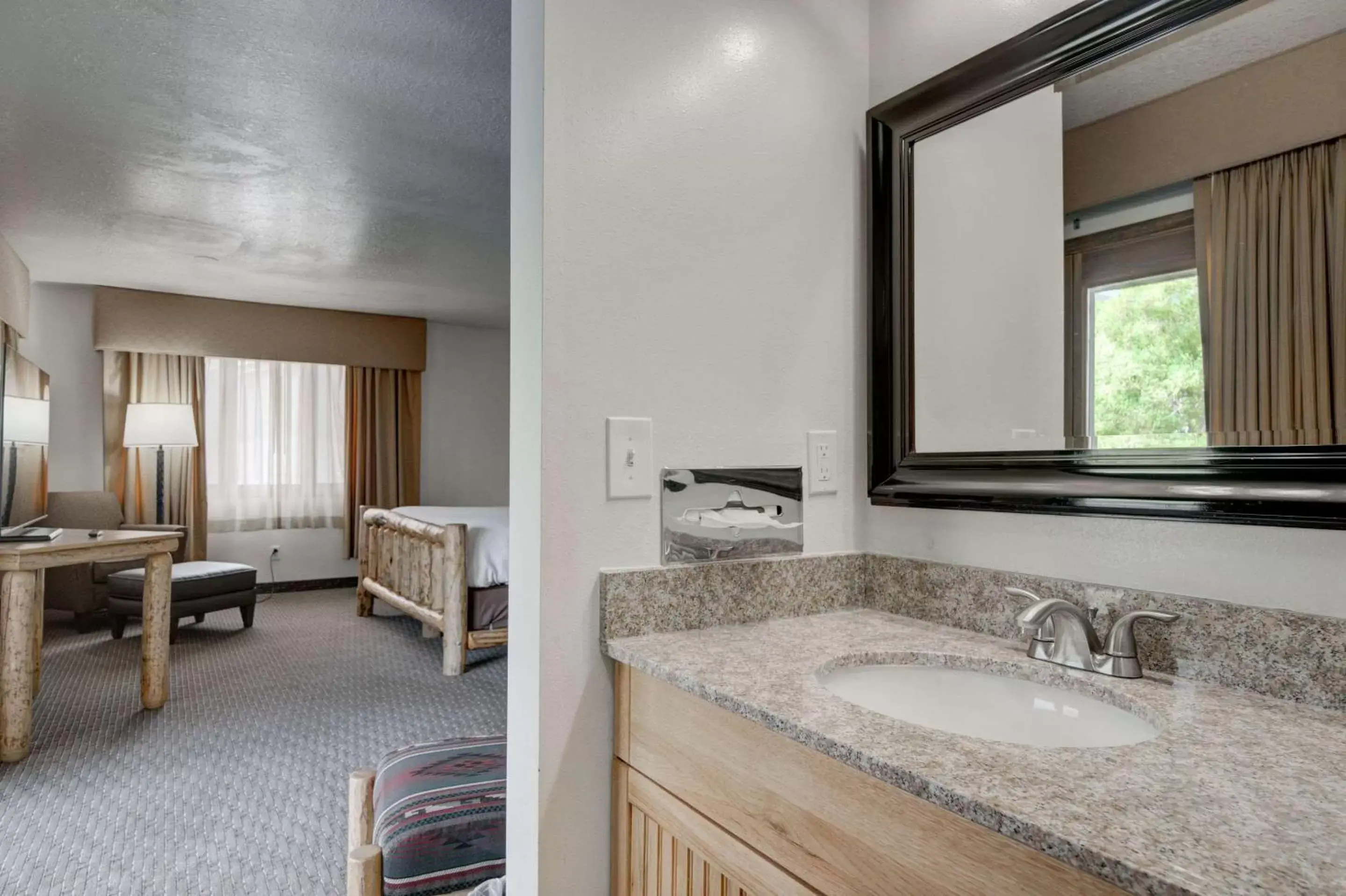 Bedroom, Bathroom in The Ridgeline Hotel at Yellowstone, Ascend Hotel Collection