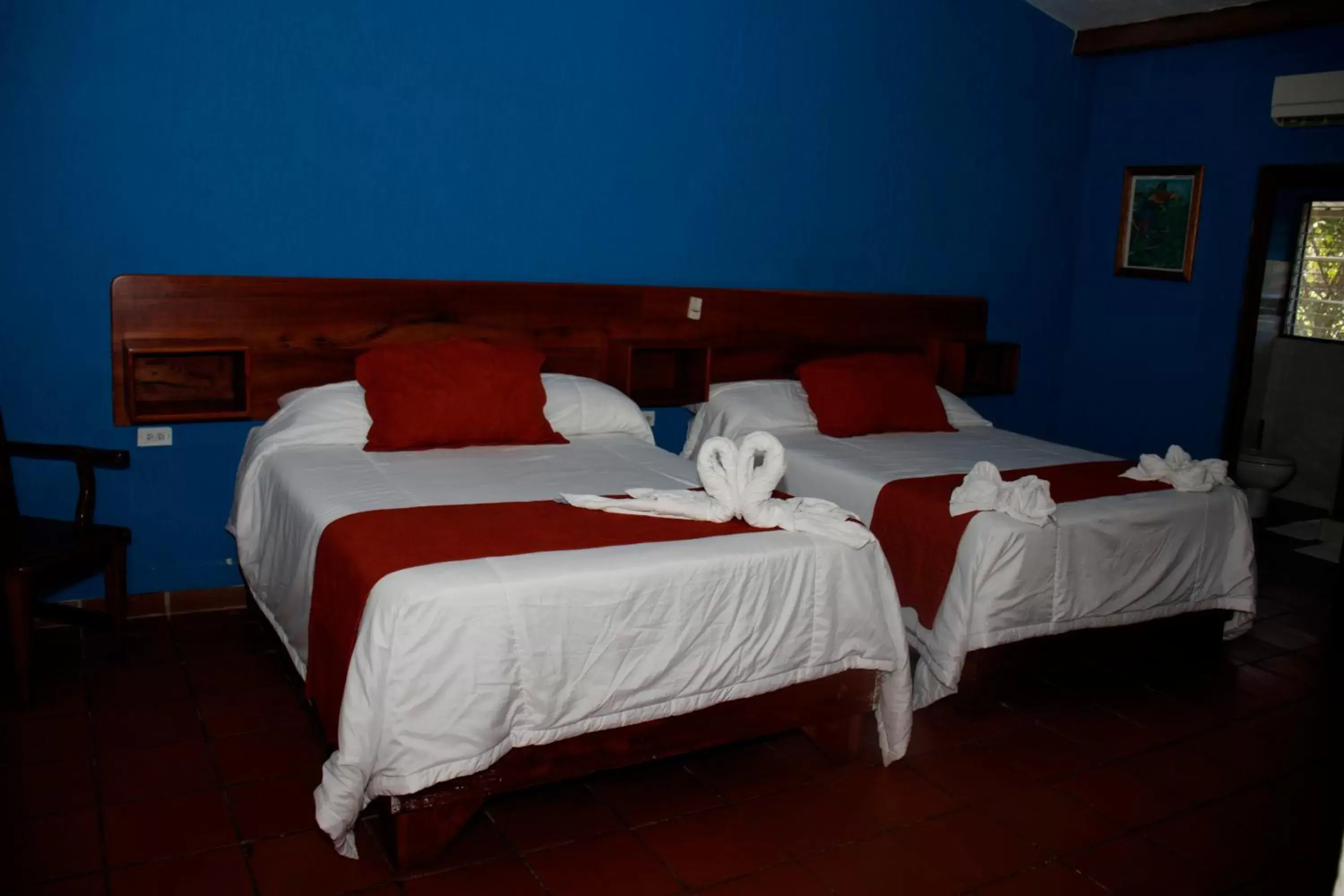 Photo of the whole room, Bed in Hotel Samoa del Sur