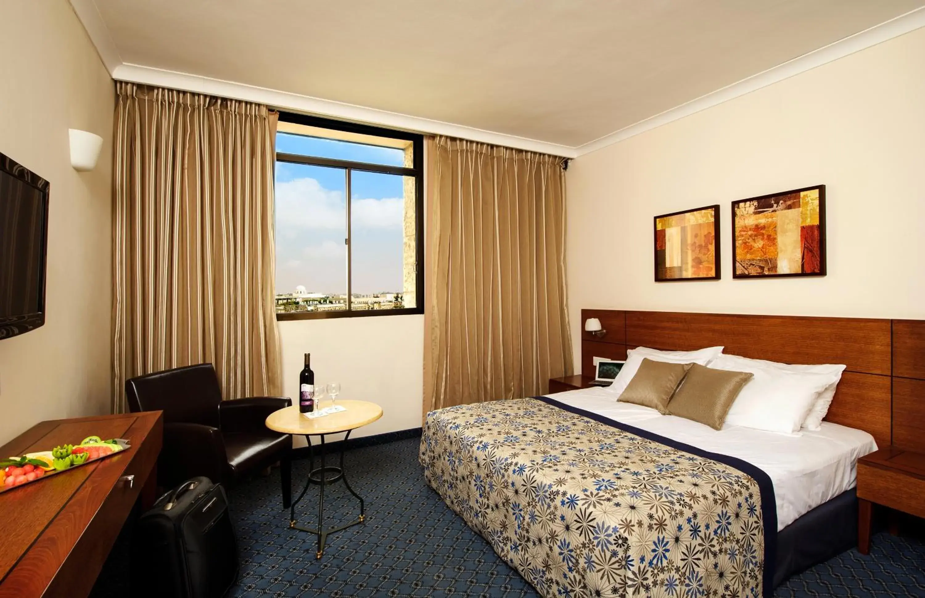 Bedroom in Caesar Premier Jerusalem Hotel