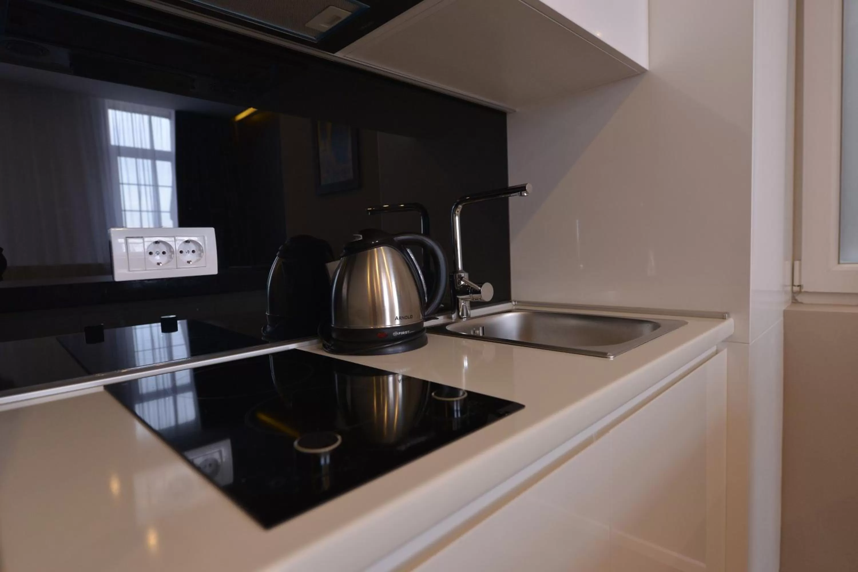 Kitchen or kitchenette in Boutique Rooms