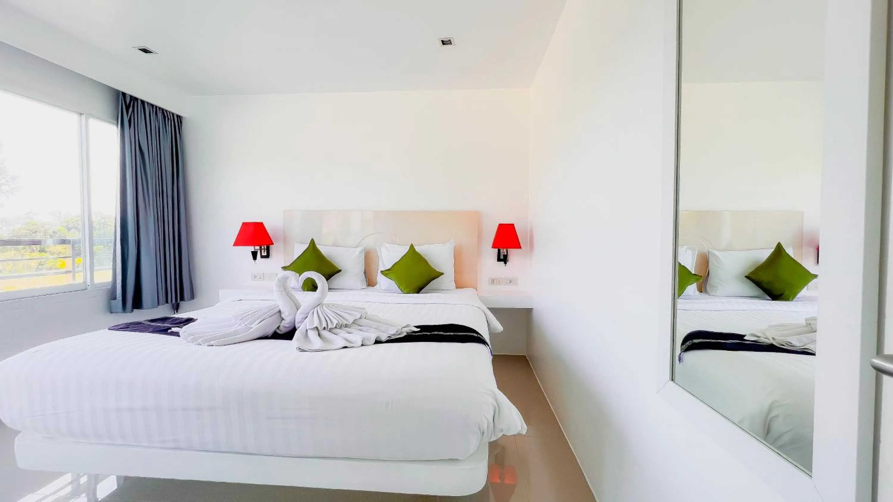 Bed in Grand Sunset Hotel Phuket