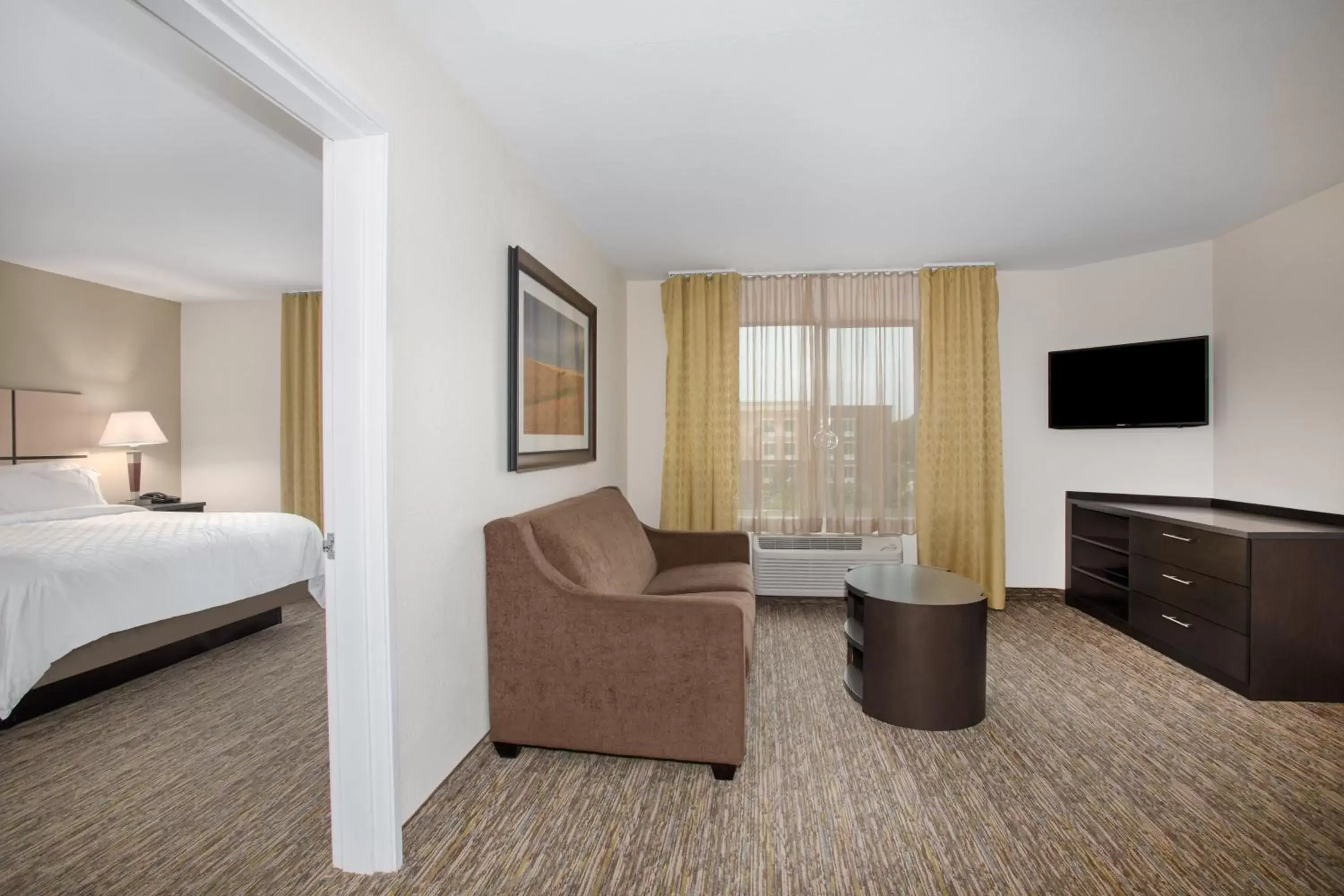 Photo of the whole room, TV/Entertainment Center in Candlewood Suites Manhattan, an IHG Hotel