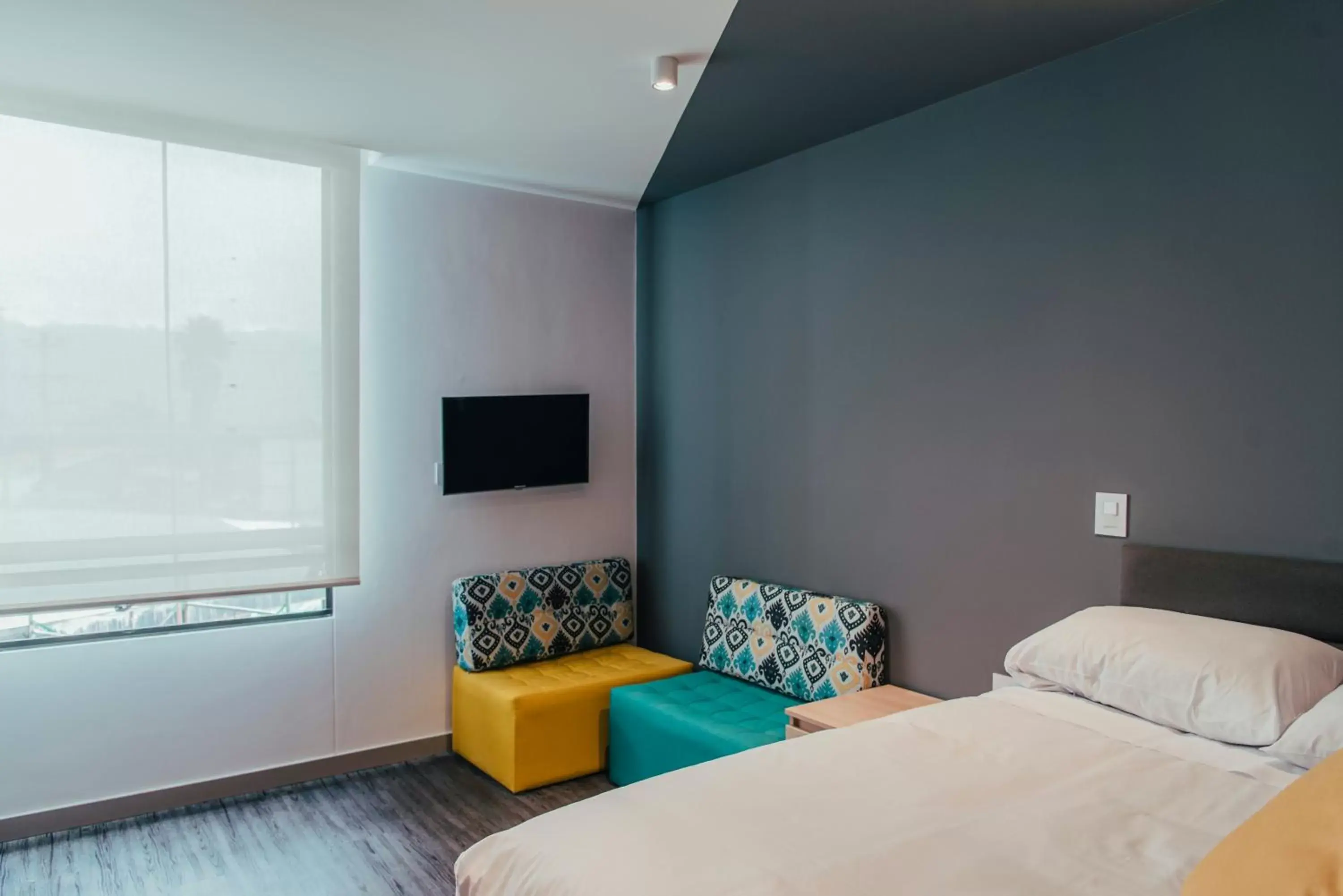 TV and multimedia, Bed in UMA Suites Chia TV and multimedia, Bed in UMA Suites Chia