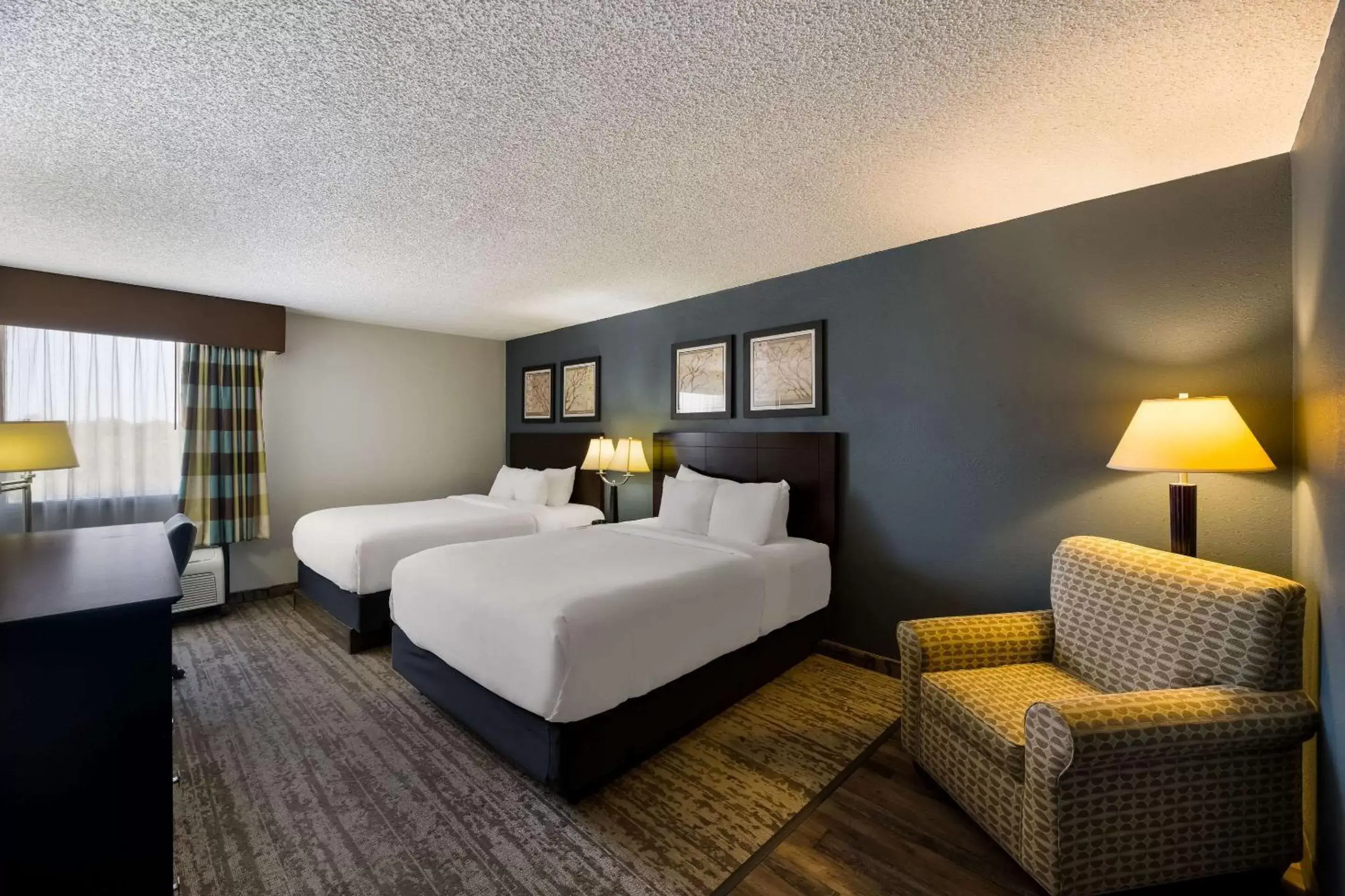 Bedroom in Clarion Hotel San Angelo near Convention Center