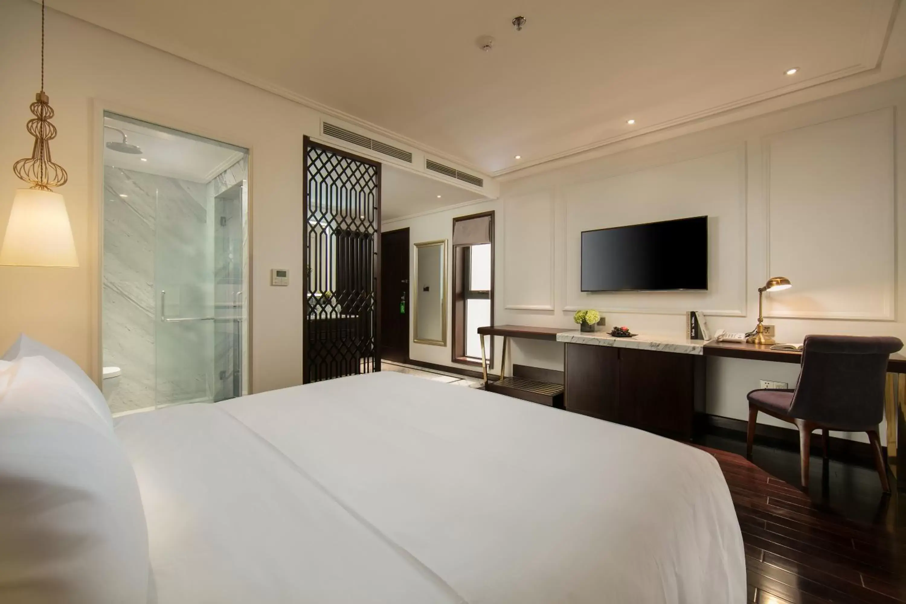Photo of the whole room, Bed in Anatole Hotel Hanoi