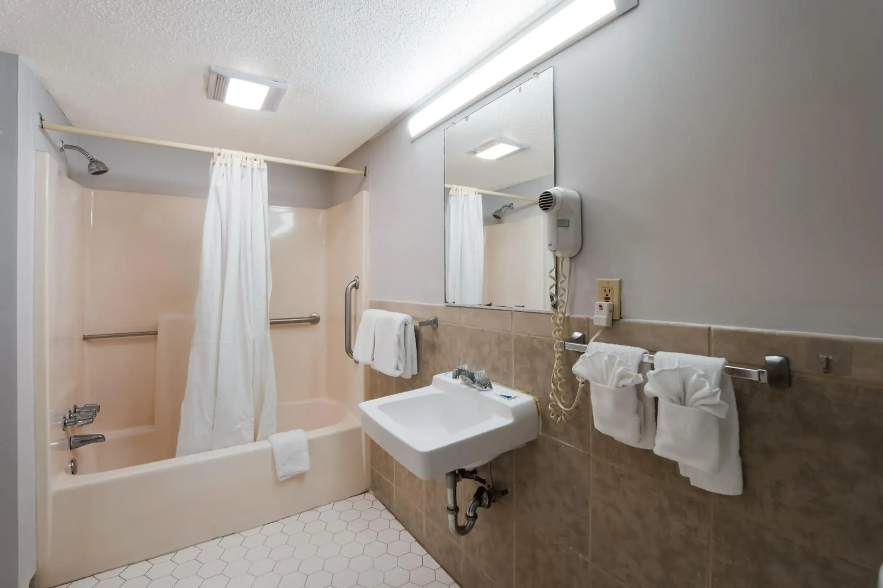 Shower, Bathroom in Rodeway Inn Augusta West