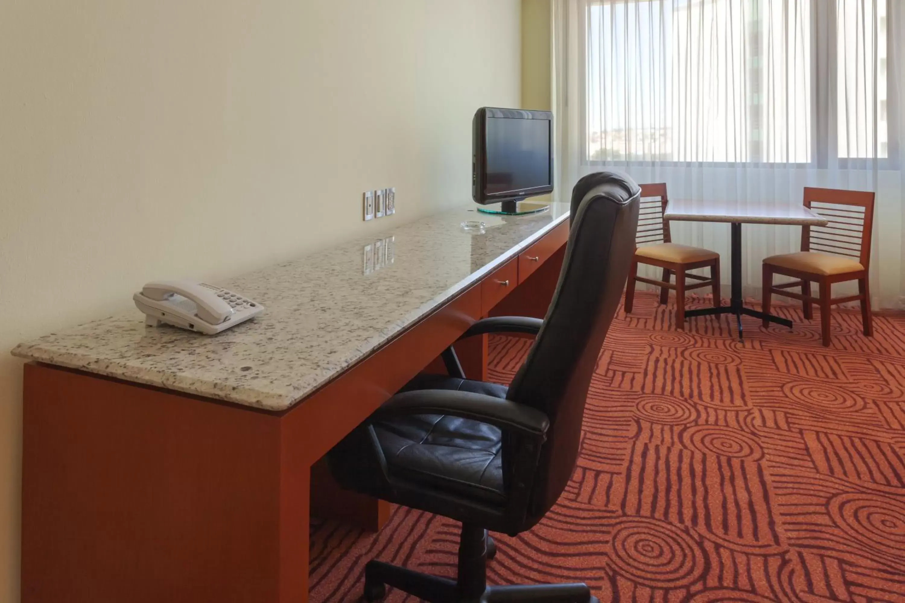 Photo of the whole room, TV/Entertainment Center in Holiday Inn Puebla Finsa, an IHG Hotel