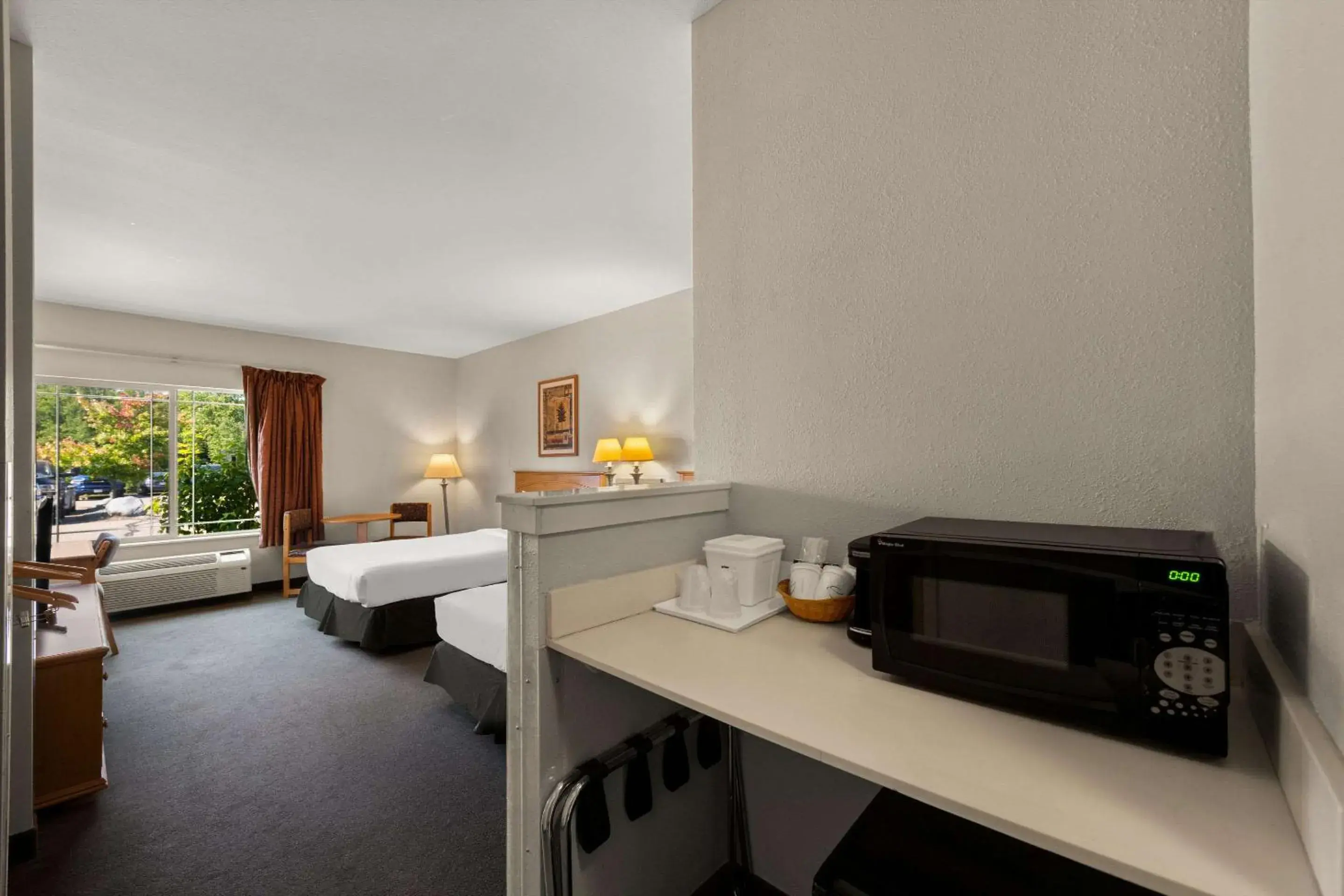 Bedroom in Rodeway Inn & Suites