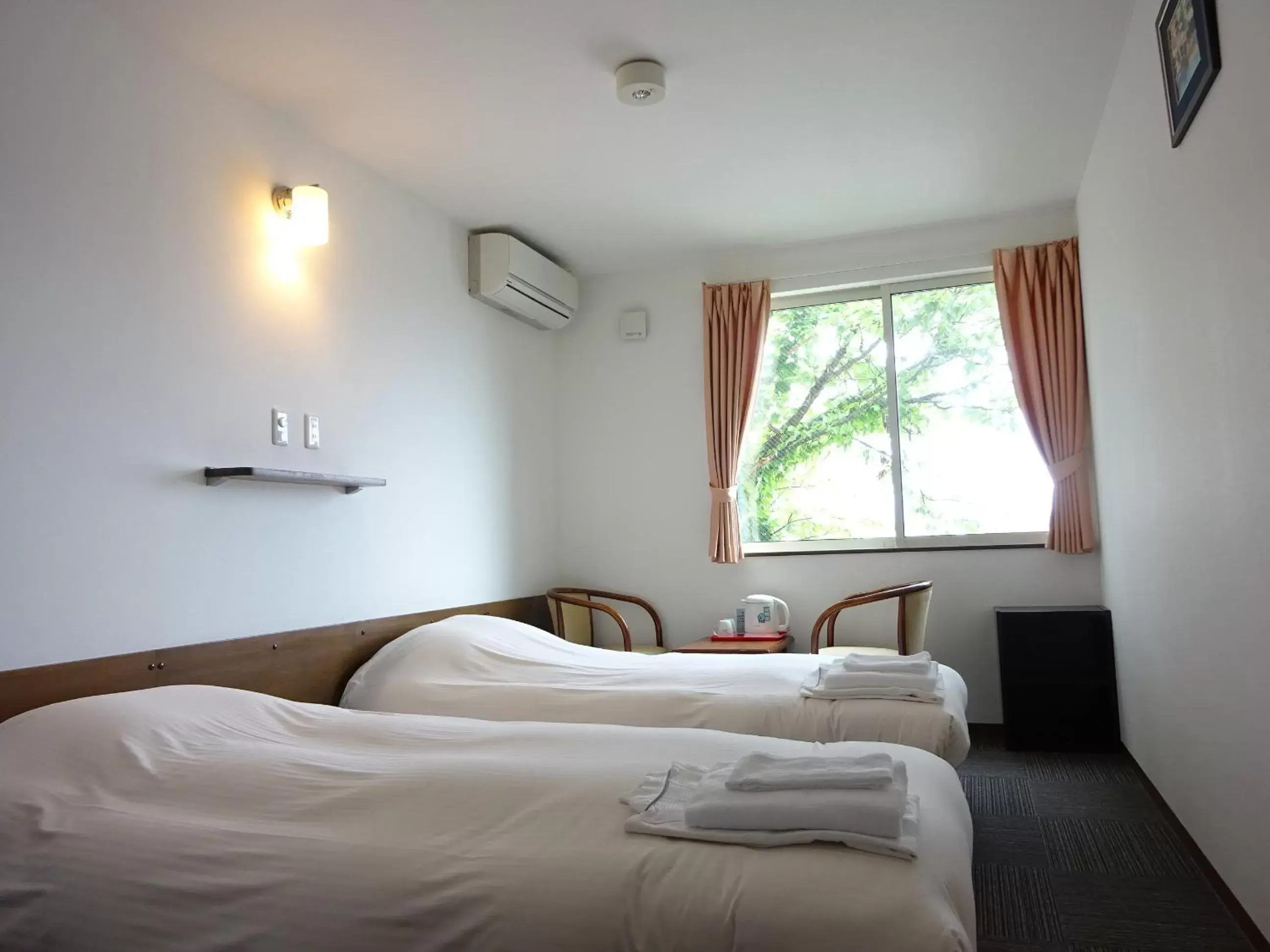 Bed in Hakodate Motomachi Hotel