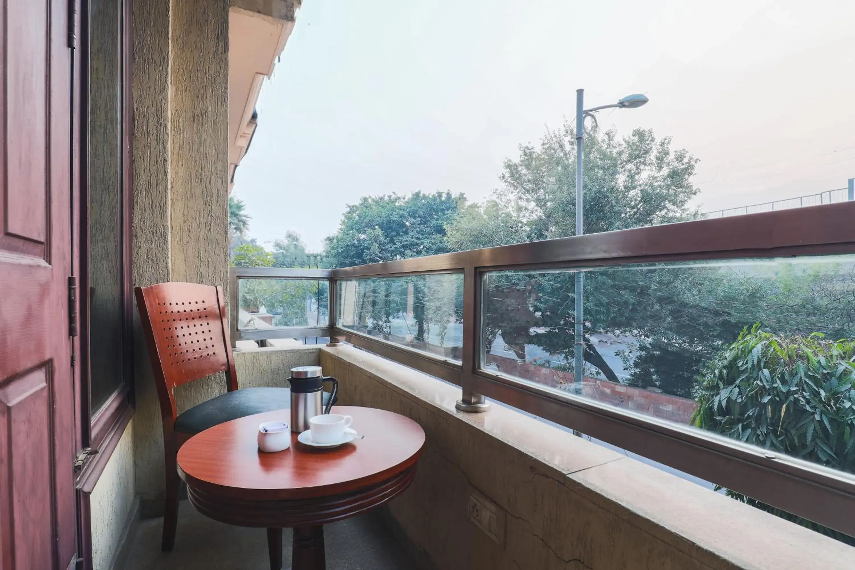 Balcony/Terrace in Cosy Grand, Near Chanakyapuri, Embassy Area