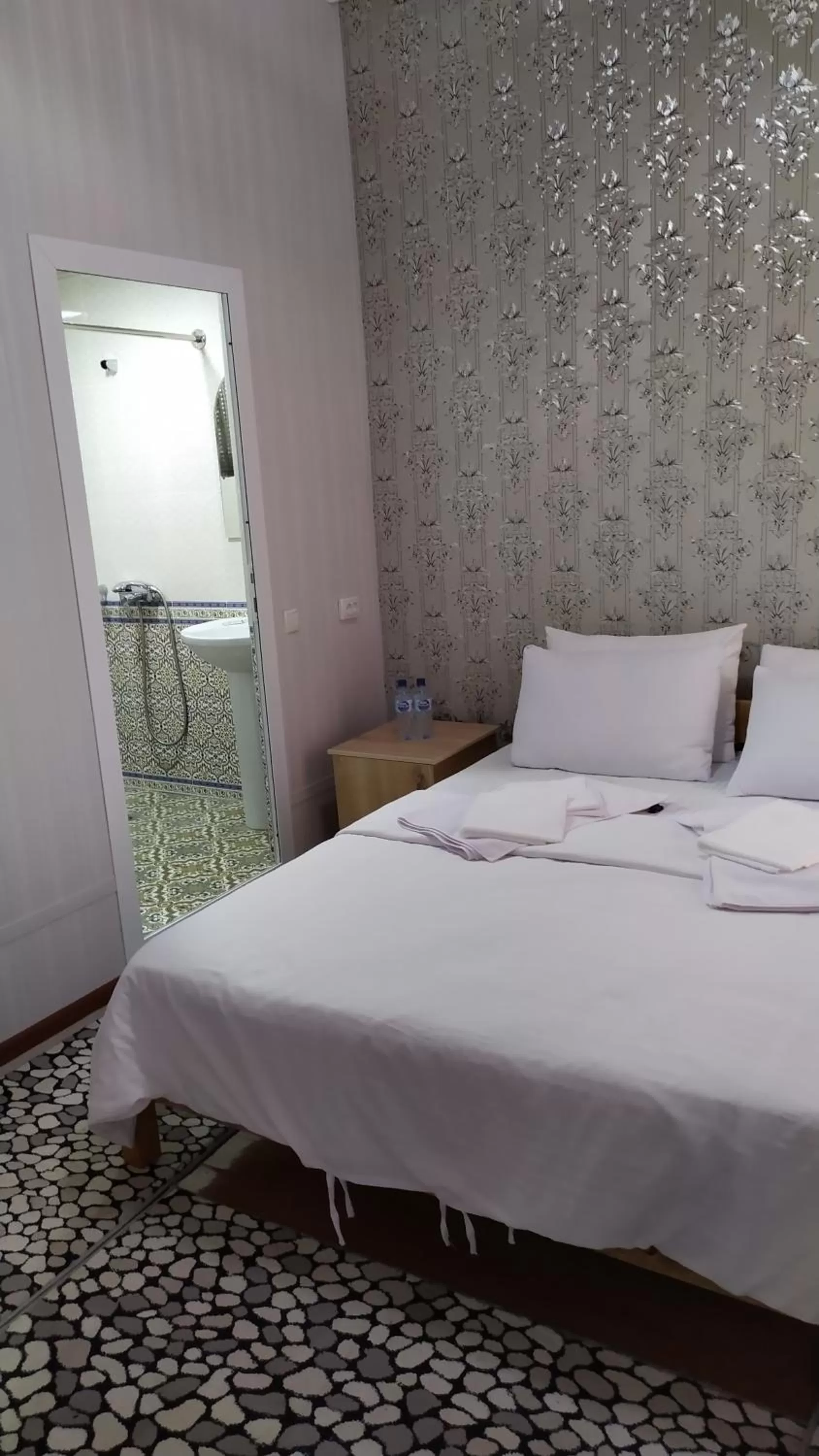 Bed in Alisher B&B Chorbog'