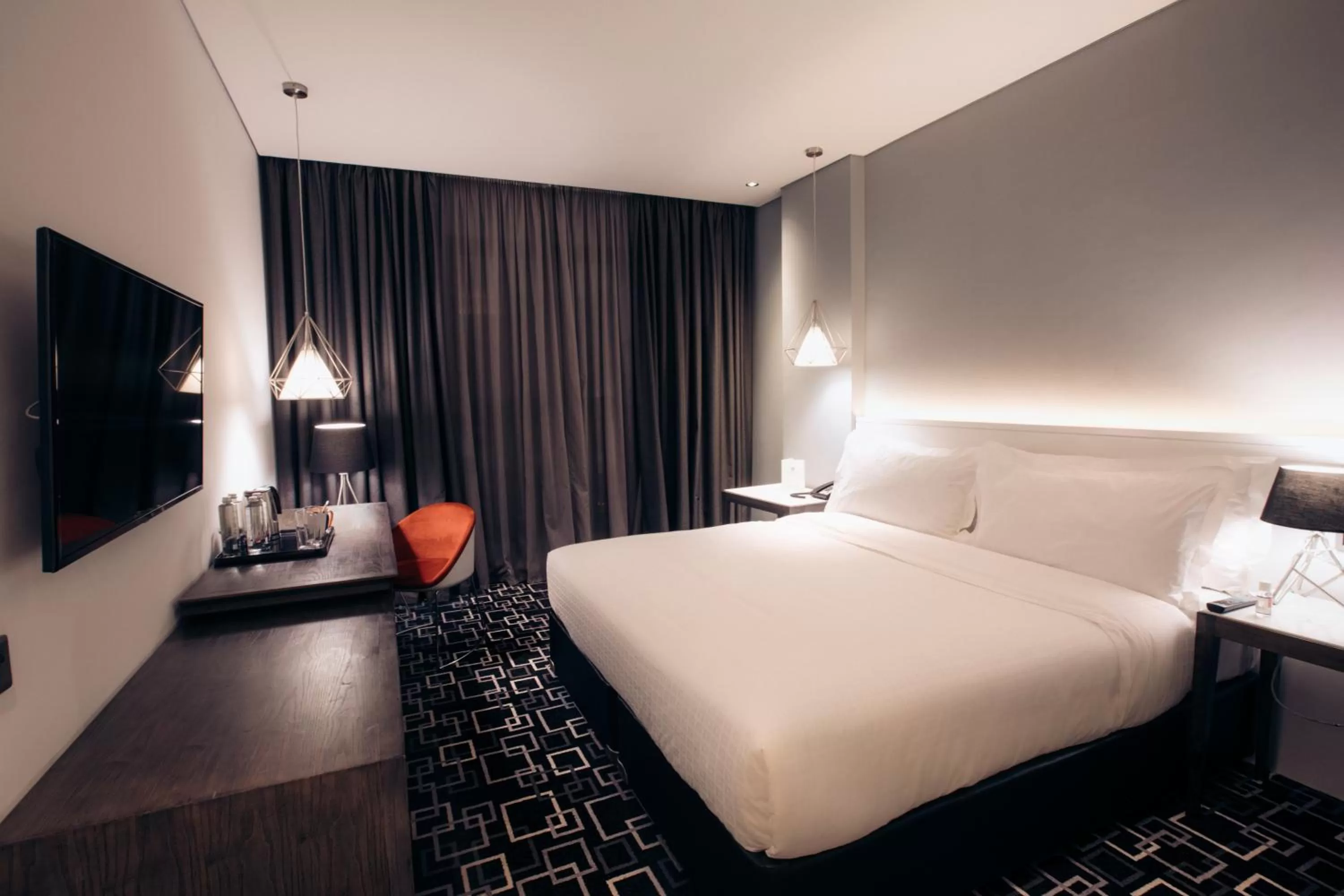 Bed in Trademark Hotel, a Member of Design Hotels