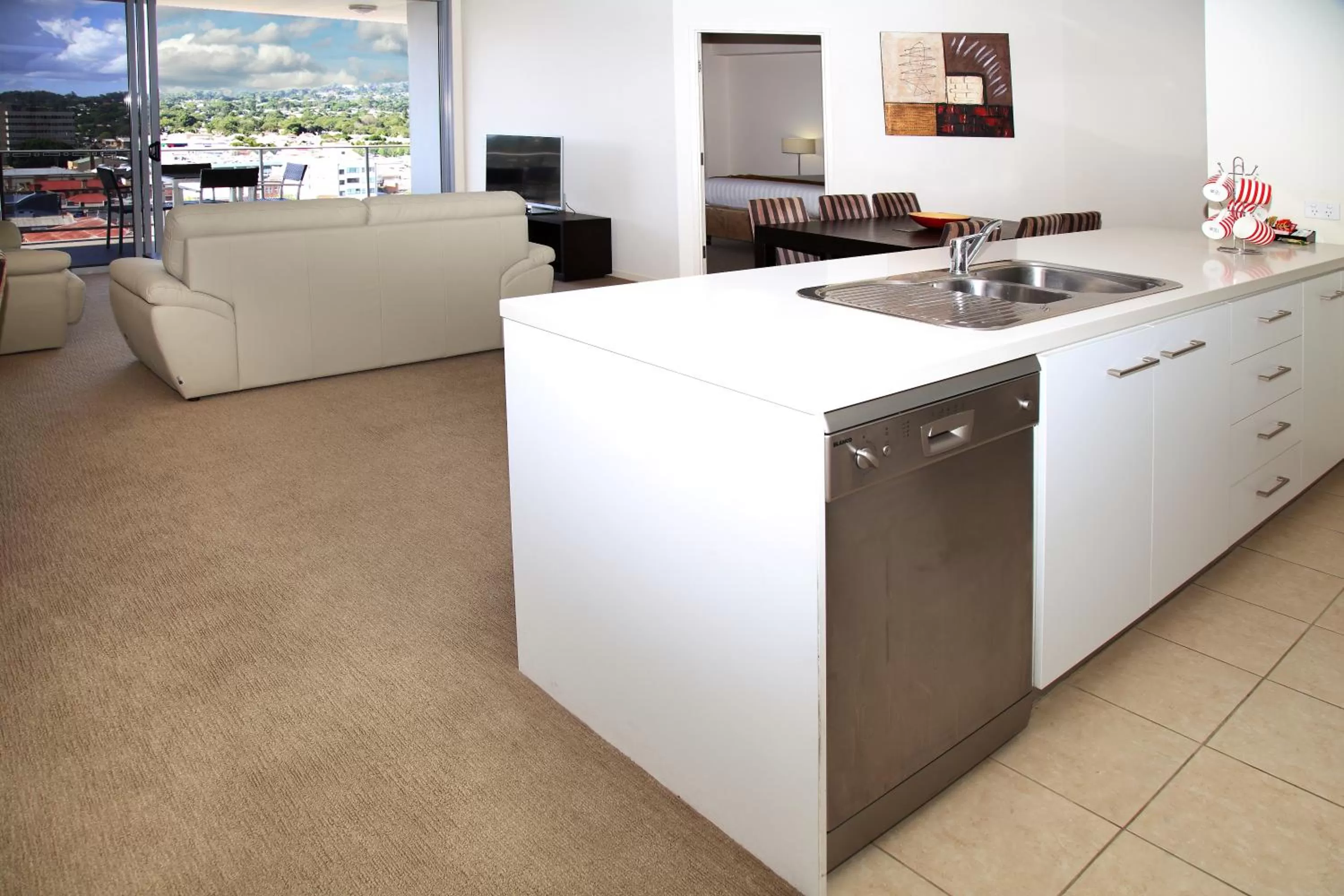 Kitchen or kitchenette in Toowoomba Central Plaza Apartment Hotel Official