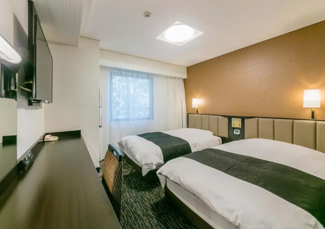 Photo of the whole room, Bed in APA Hotel Nagasaki-eki Minami