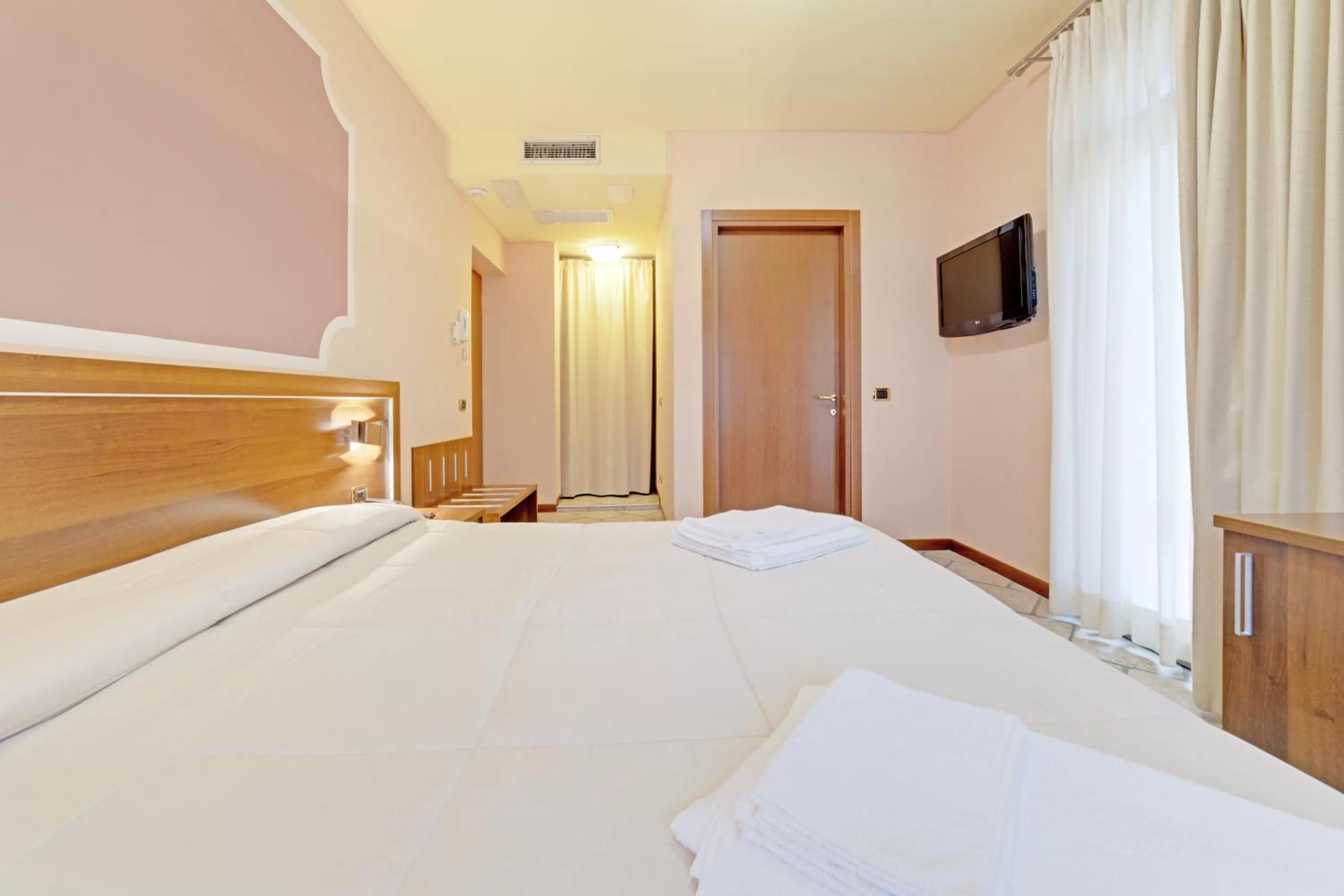 Bed in Hotel Grotto Bagat