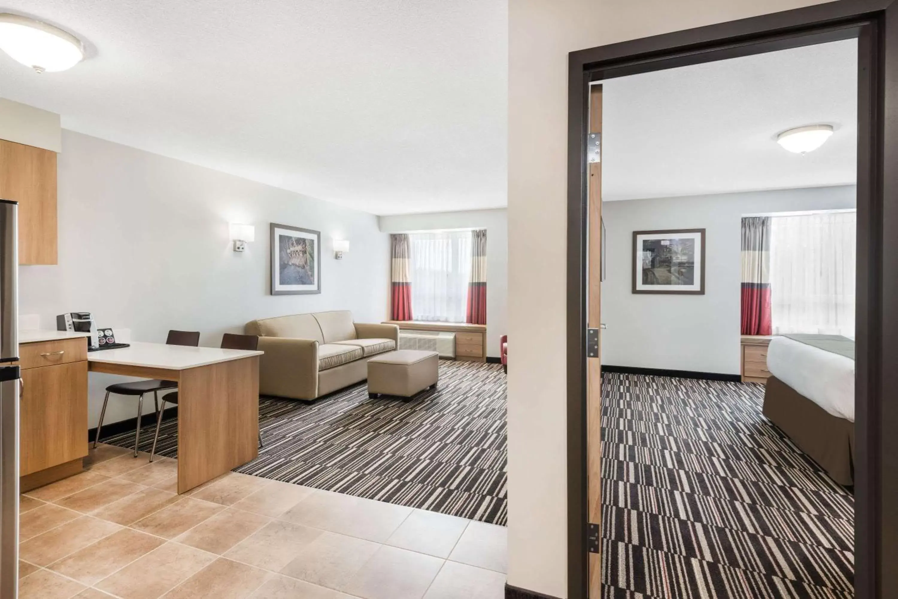 Photo of the whole room, Seating Area in Microtel Inn & Suites by Wyndham Sudbury