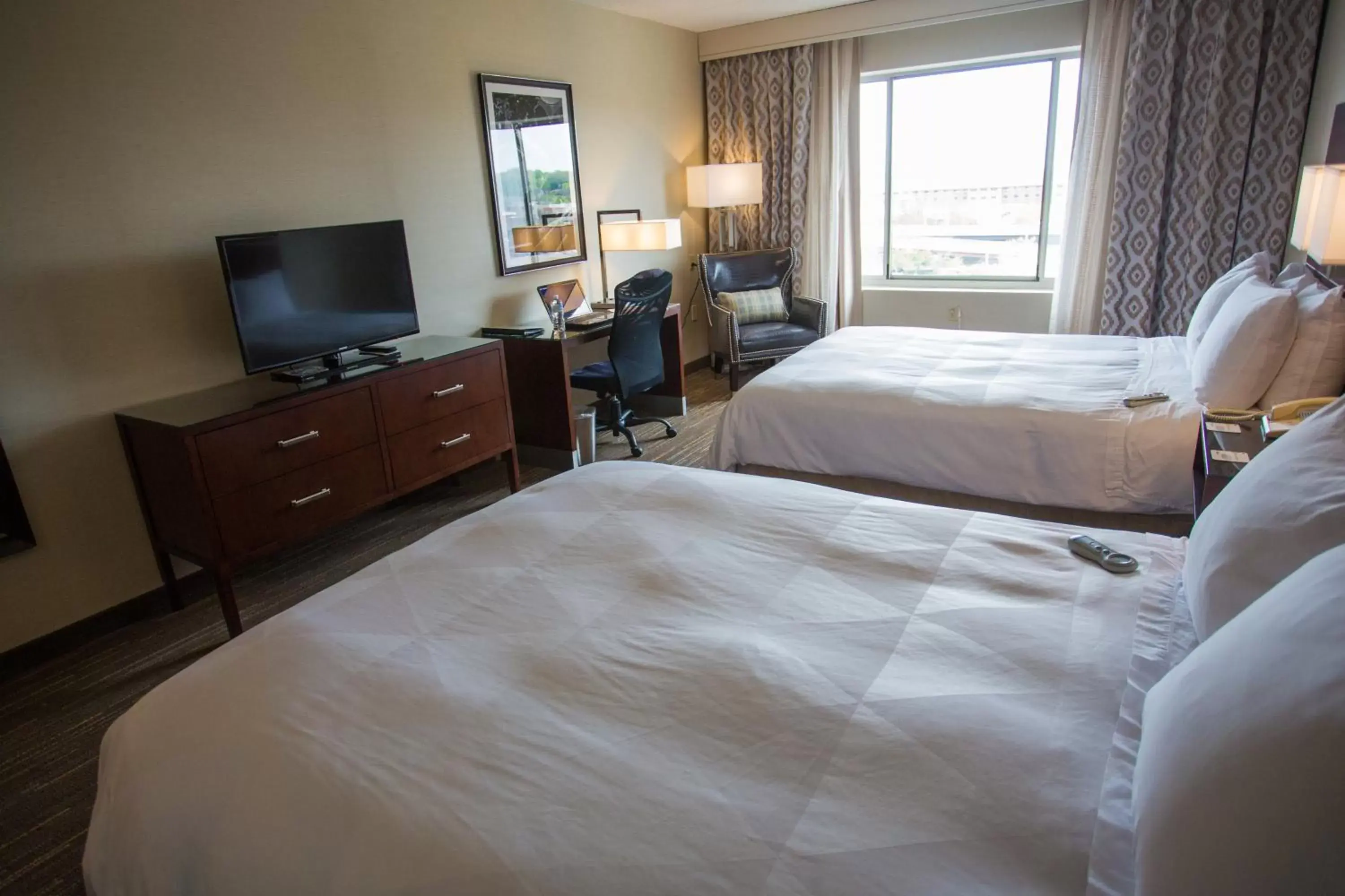 Photo of the whole room, Bed in Wyndham Moline on John Deere Commons