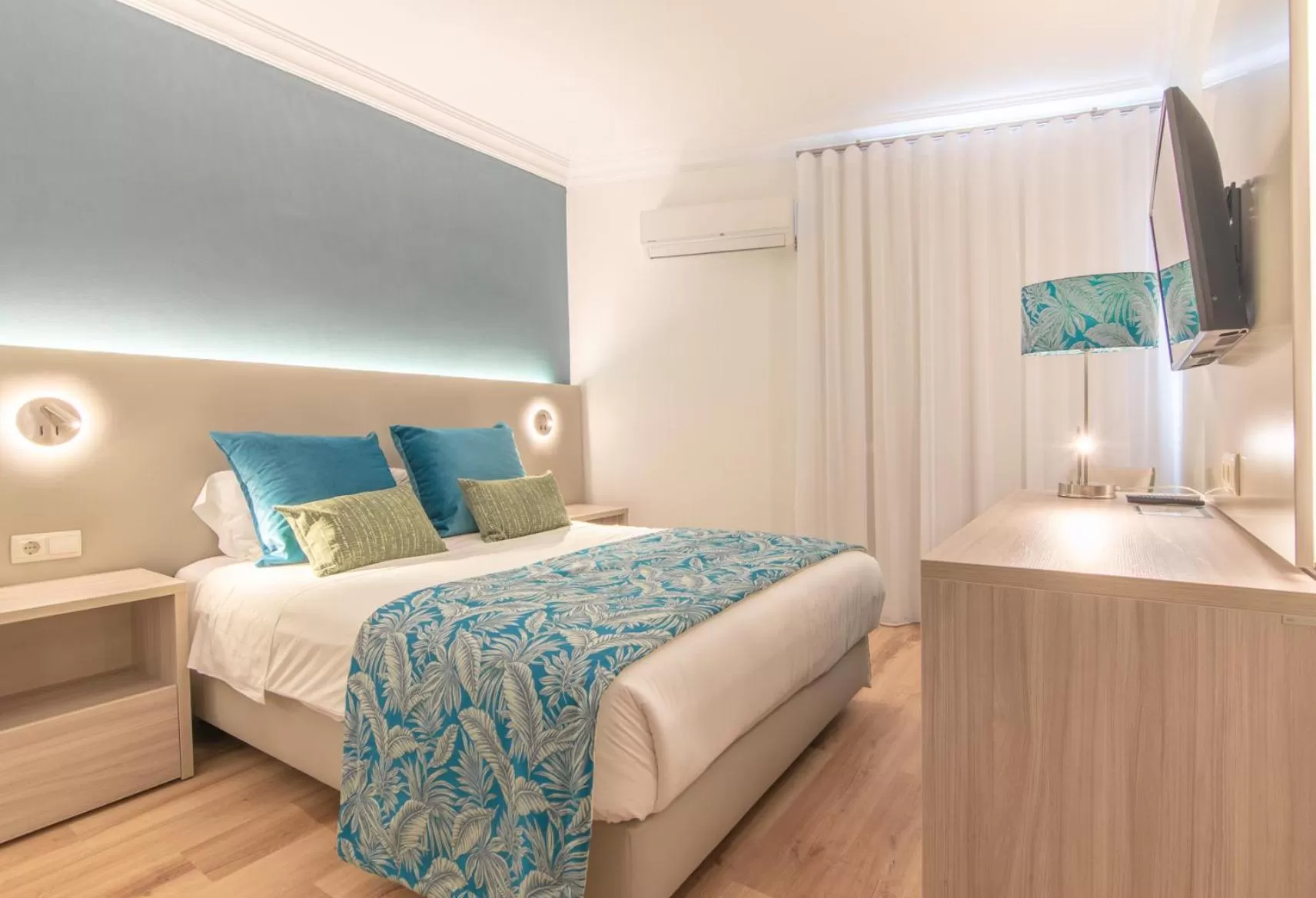 Bed in Loule Jardim Hotel