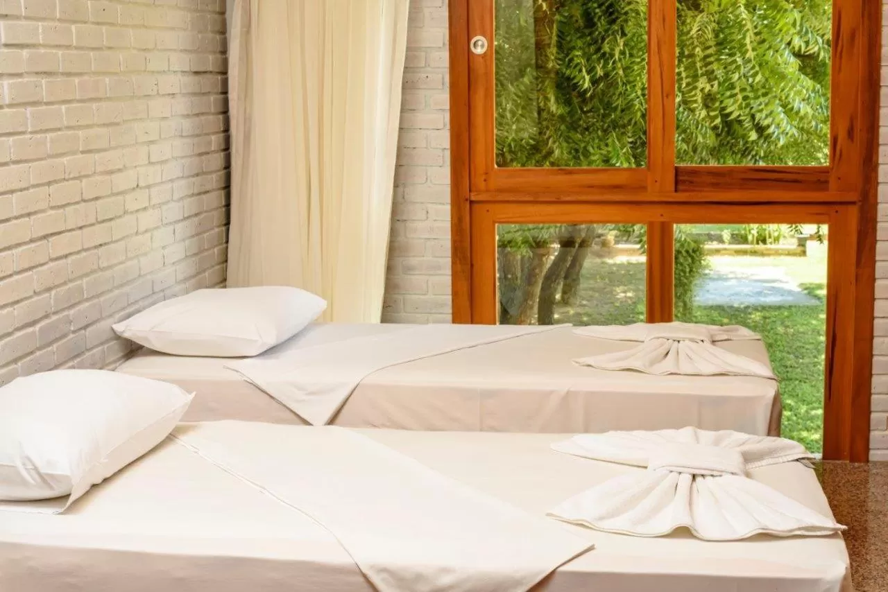 Bed in Hotel Vento Brasil