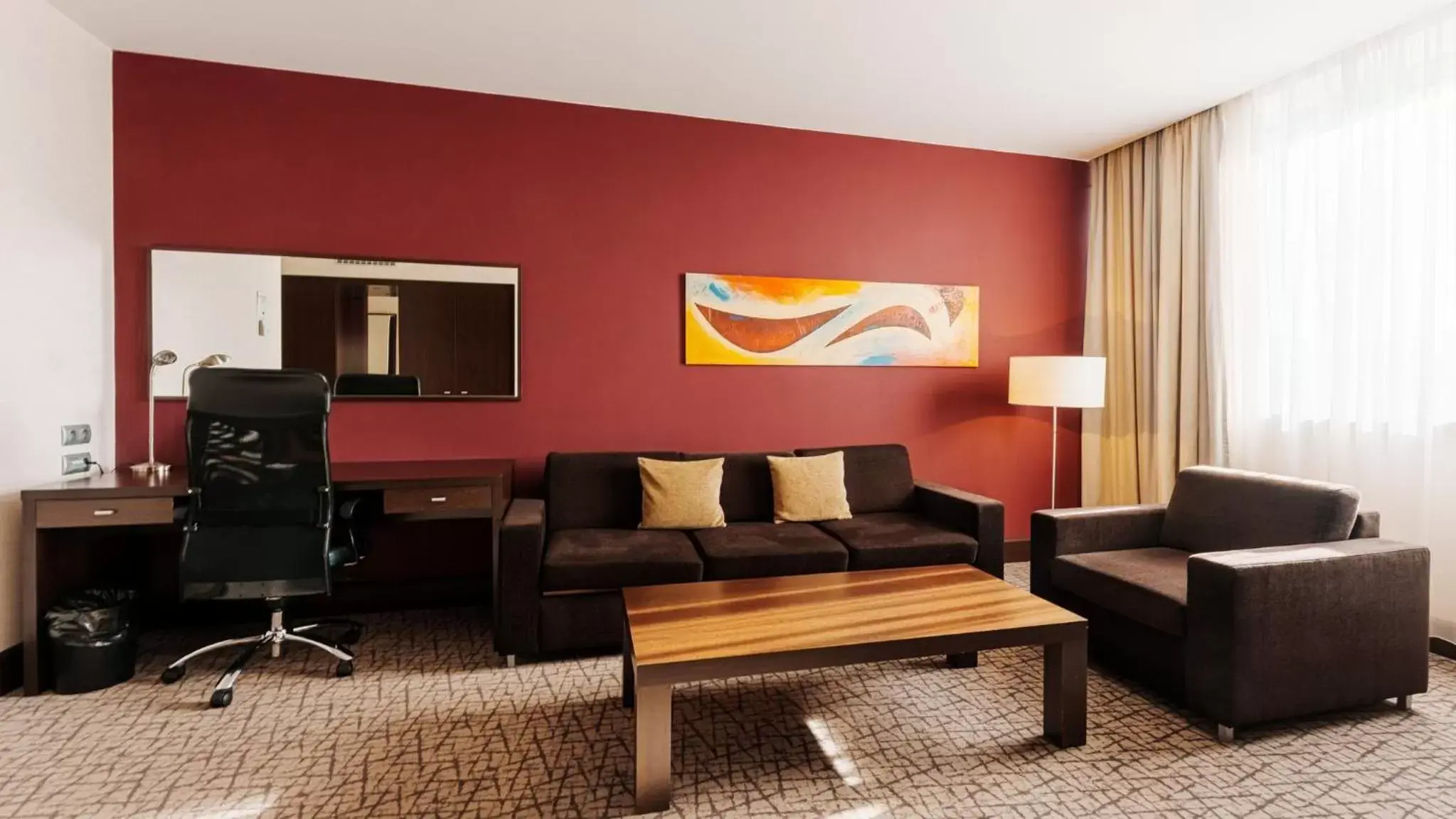 Bedroom, Seating Area in Holiday Inn Zilina, an IHG Hotel