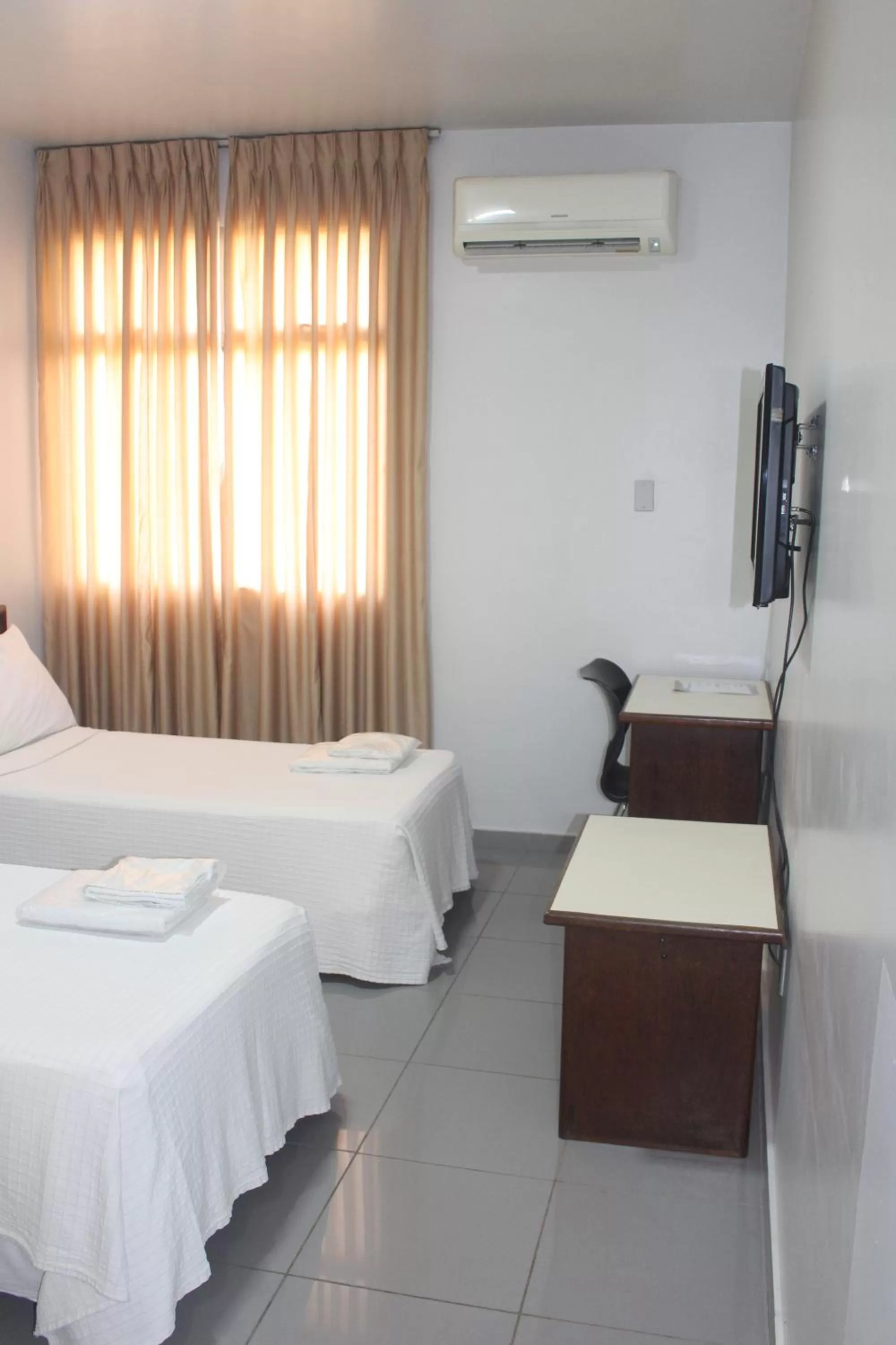 Bed in Hotel Oscar Econômico Montes Claros