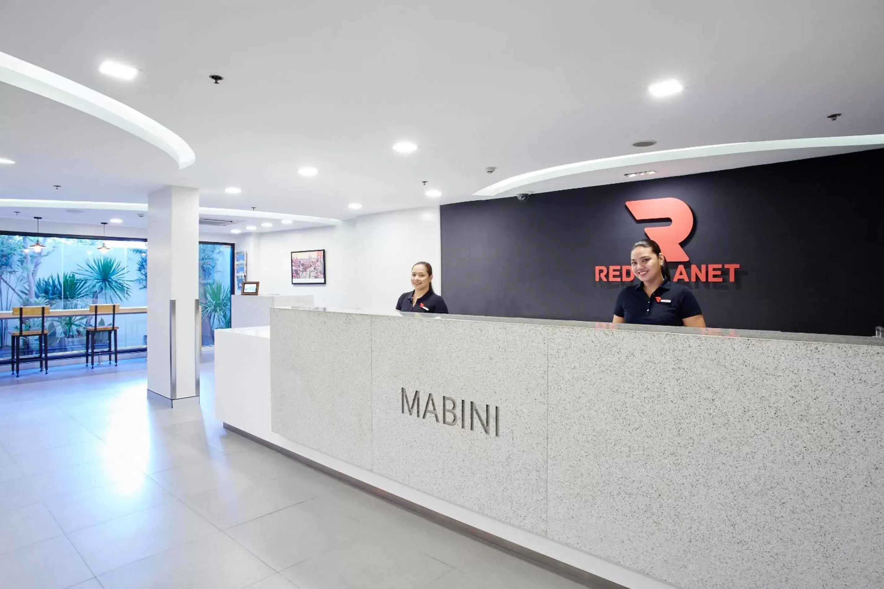 Staff, Lobby/Reception in Red Planet Manila Malate Mabini