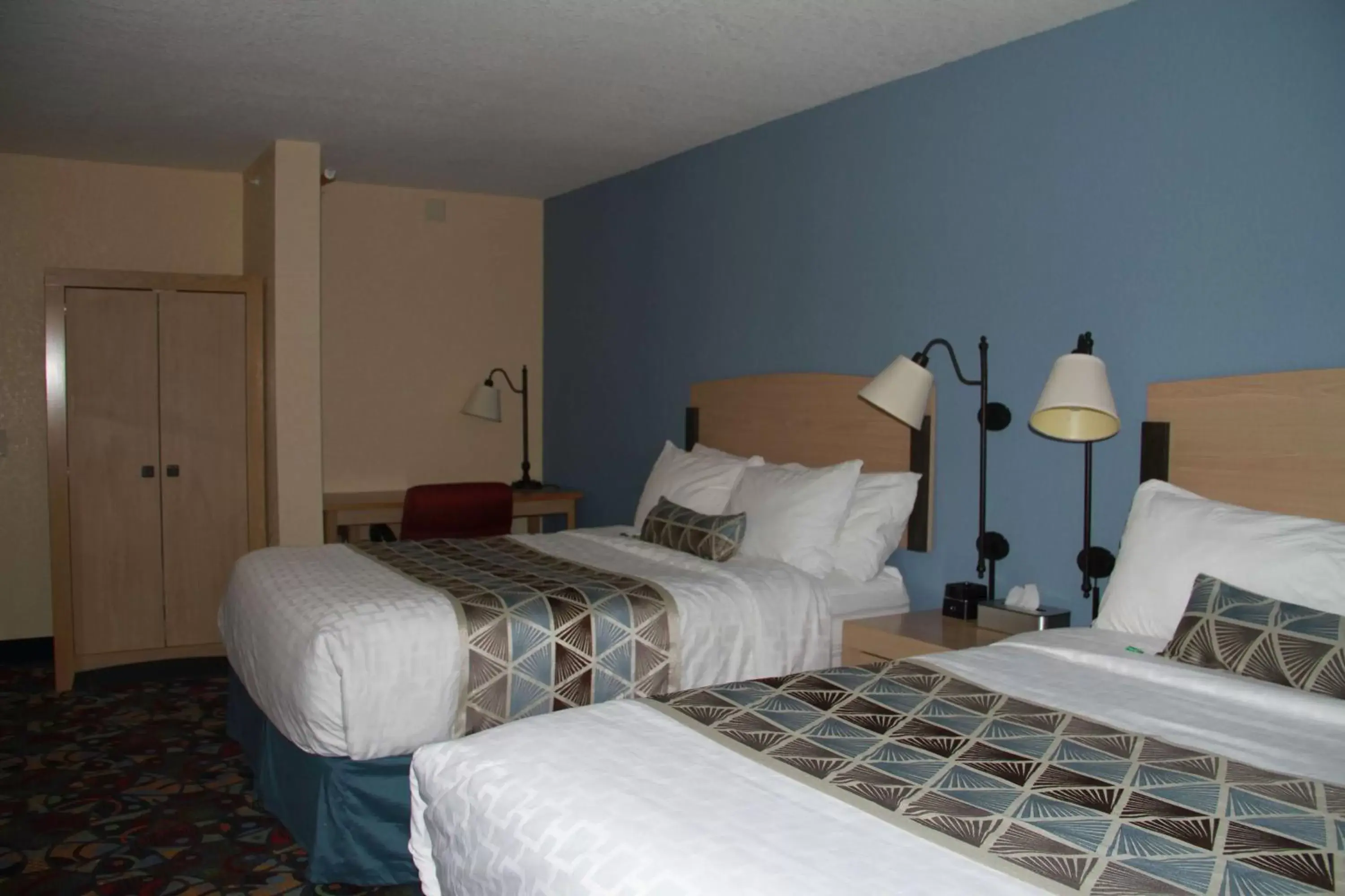 Photo of the whole room, Bed in Baymont by Wyndham Stevens Point
