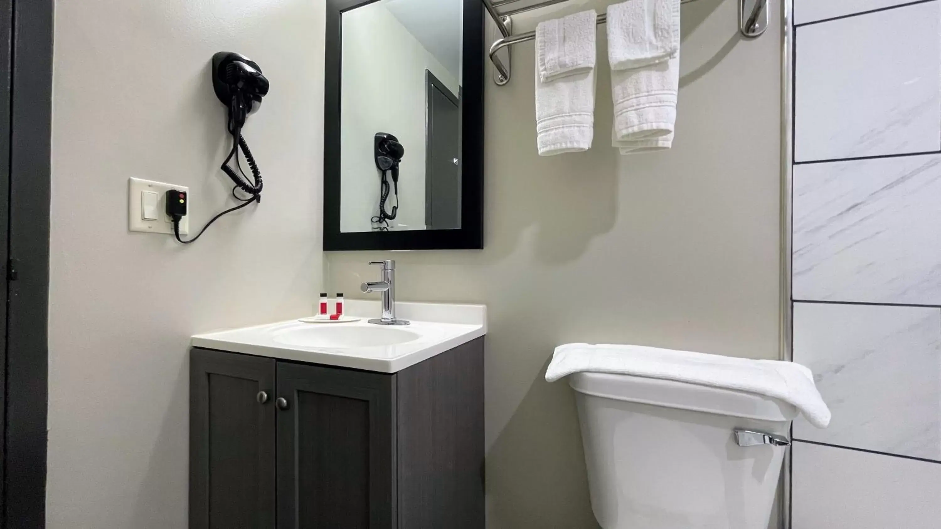 Bathroom in Days Inn by Wyndham Columbus IN Bathroom in Days Inn by Wyndham Columbus IN