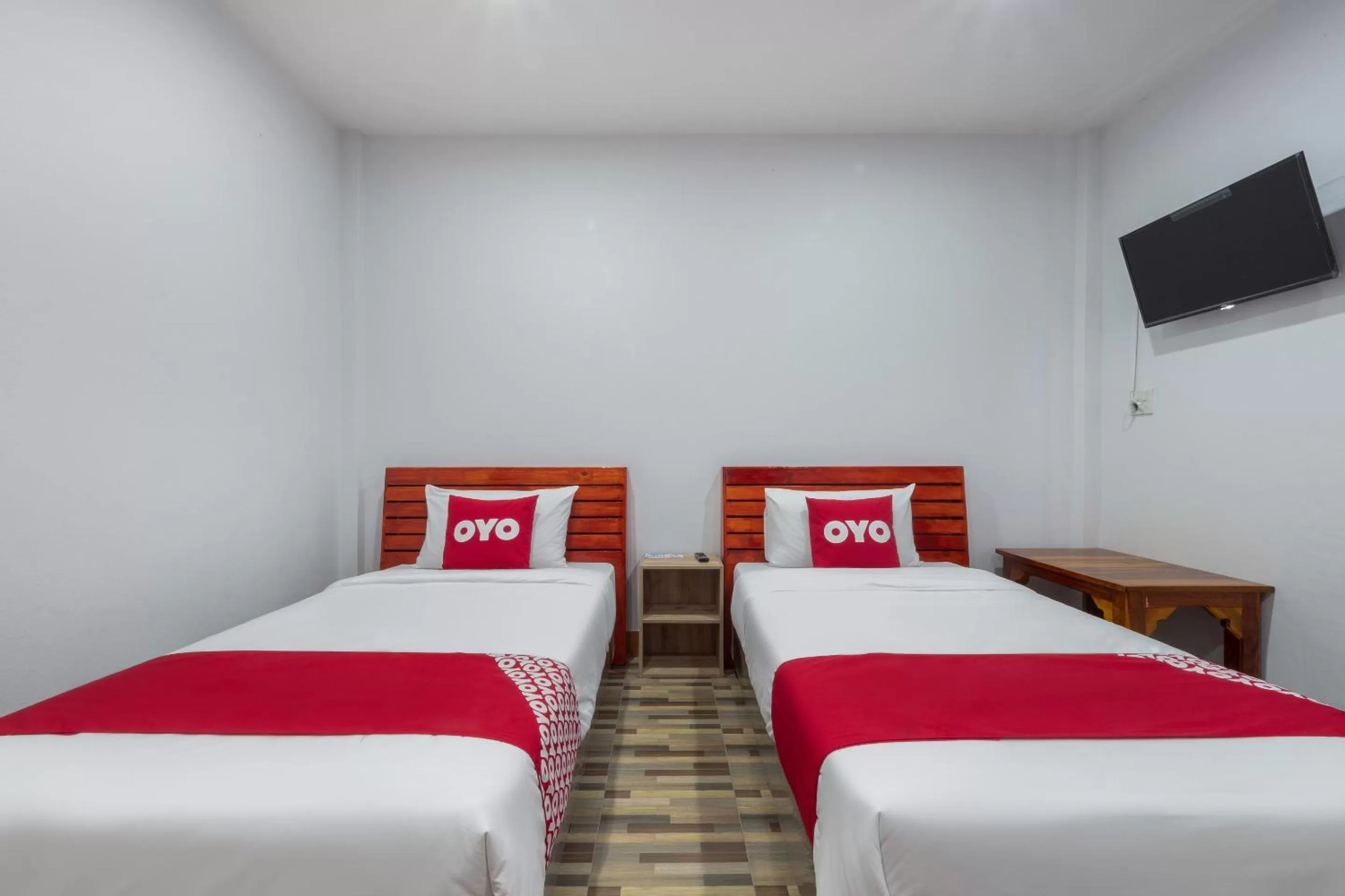 Bedroom in OYO 1044 Vassana Resort