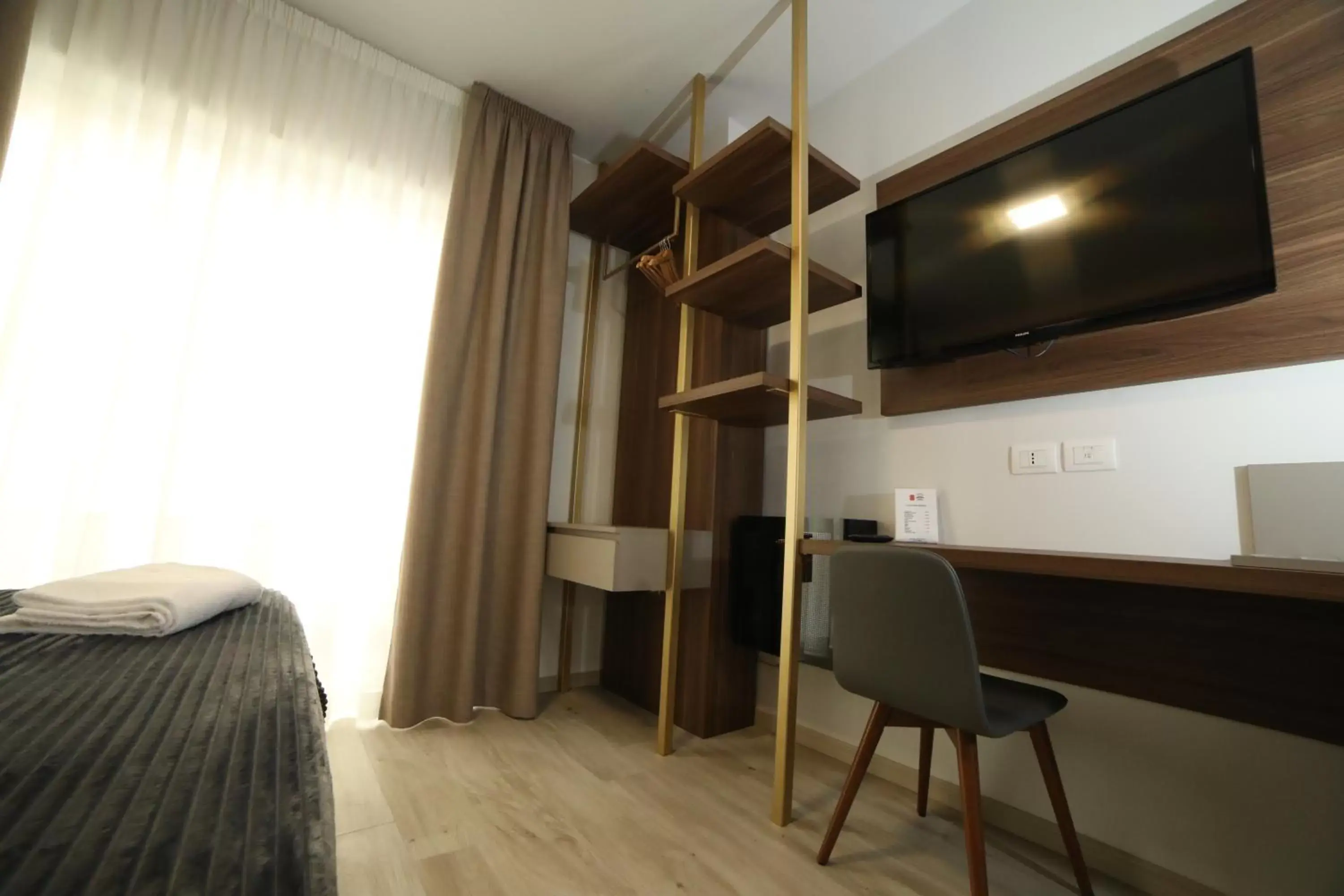 TV and multimedia, TV/Entertainment Center in 8room Hotel