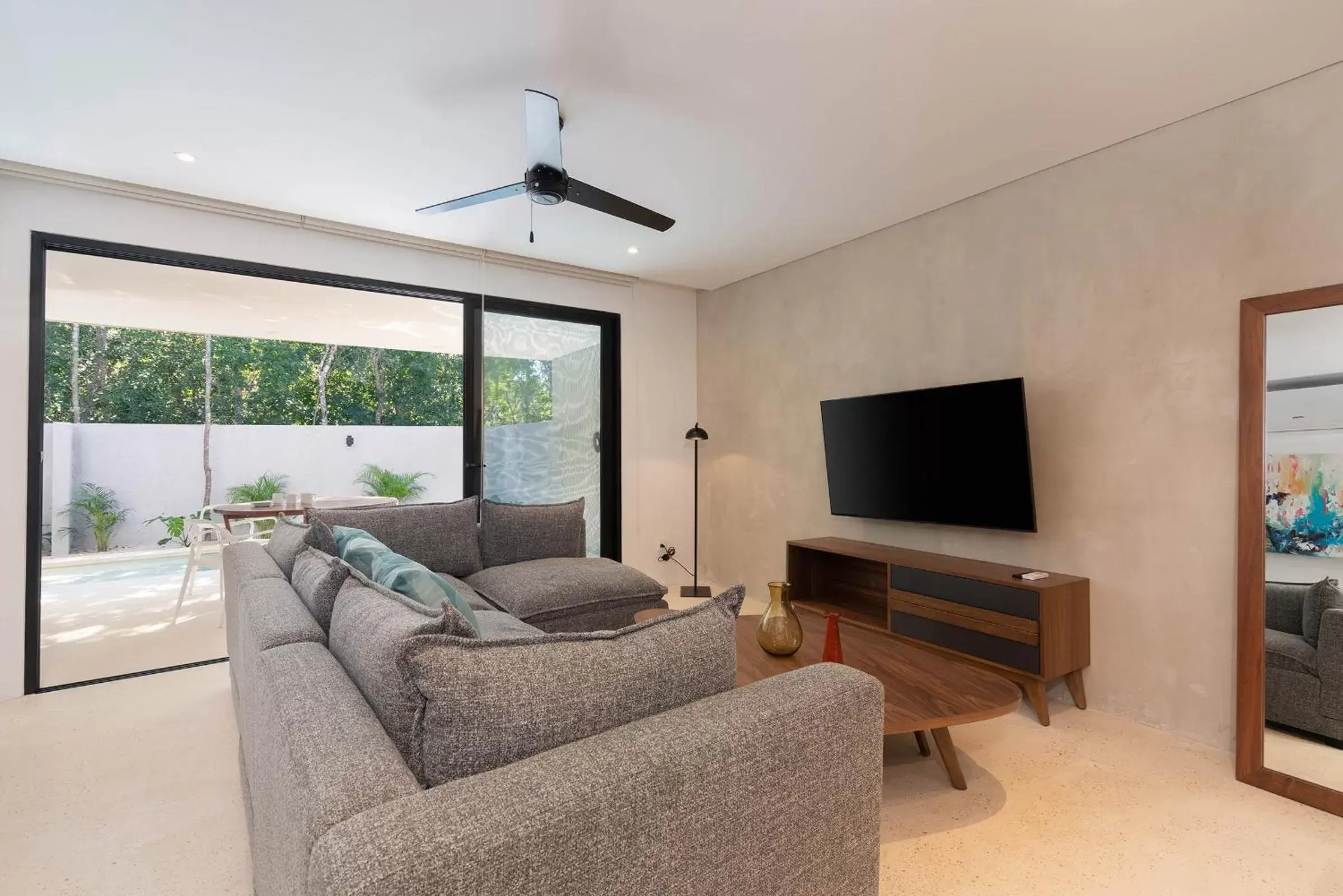 TV and multimedia, Seating Area in Suites at TreeTops Tulum