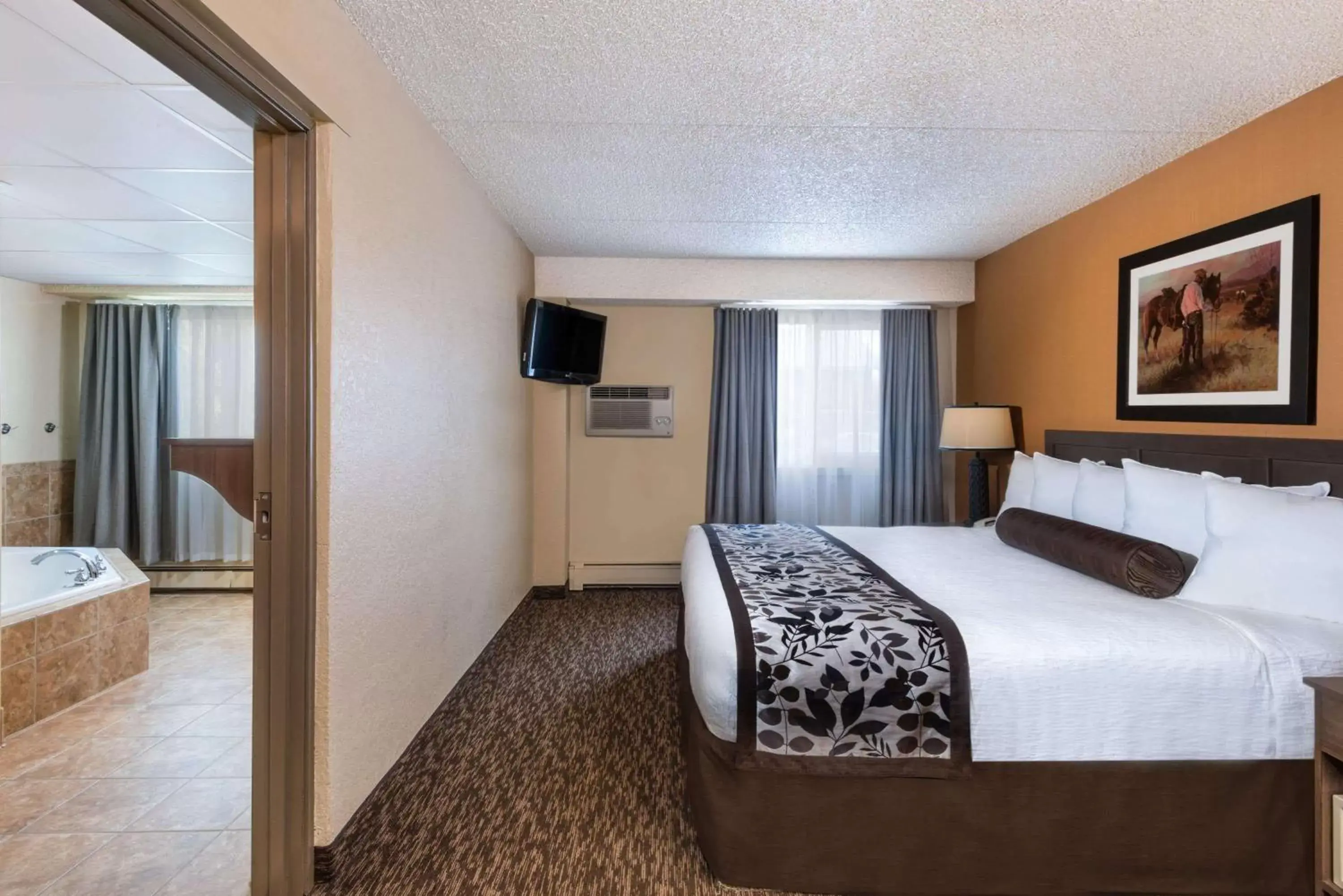Photo of the whole room, Bed in Days Inn & Suites by Wyndham Bozeman