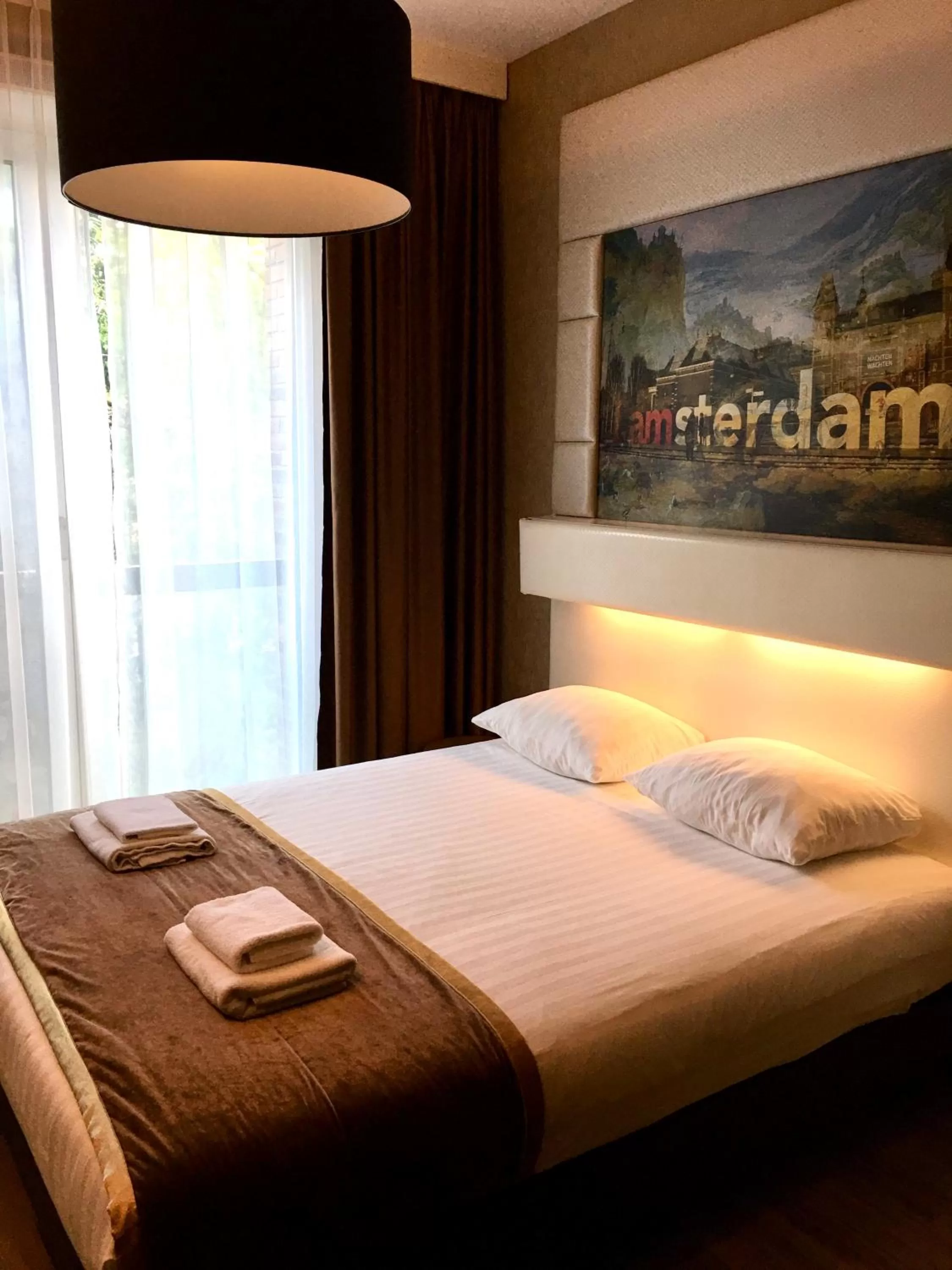 Bed in Hotel Mosaic City Centre