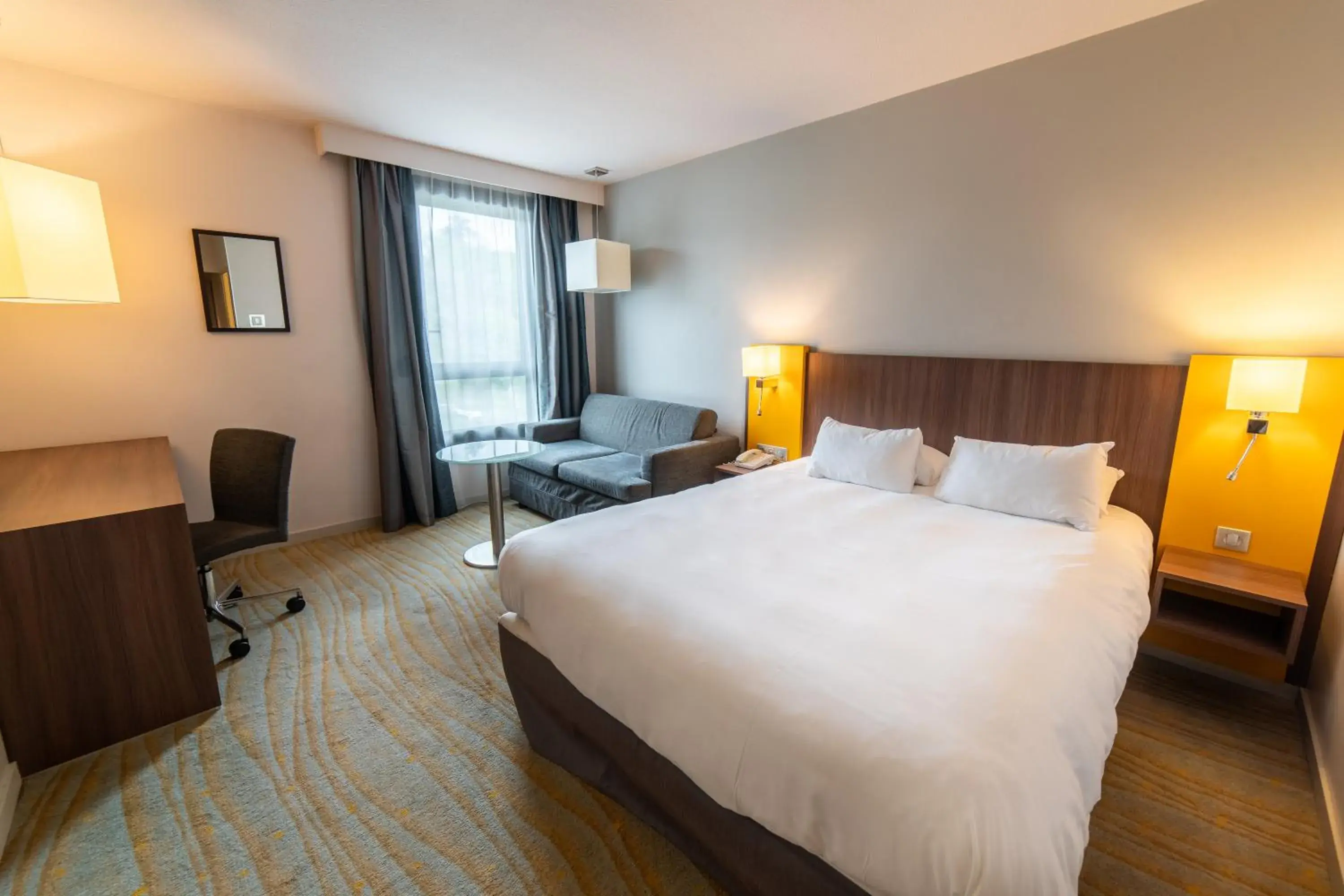 Photo of the whole room, Bed in Holiday Inn Lyon Vaise by IHG Photo of the whole room, Bed in Holiday Inn Lyon Vaise by IHG