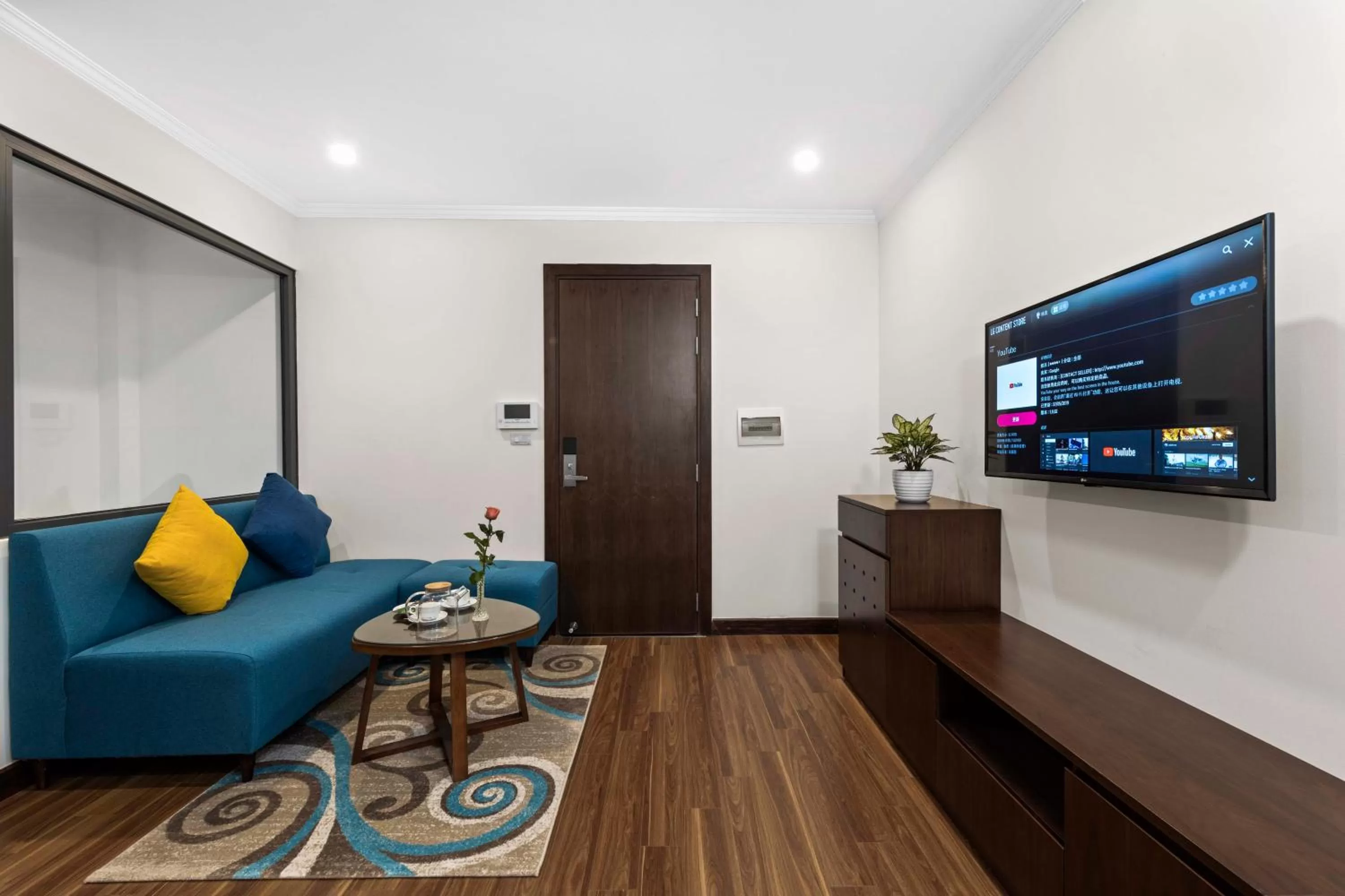 Communal lounge/ TV room in Newsky Serviced Apartment