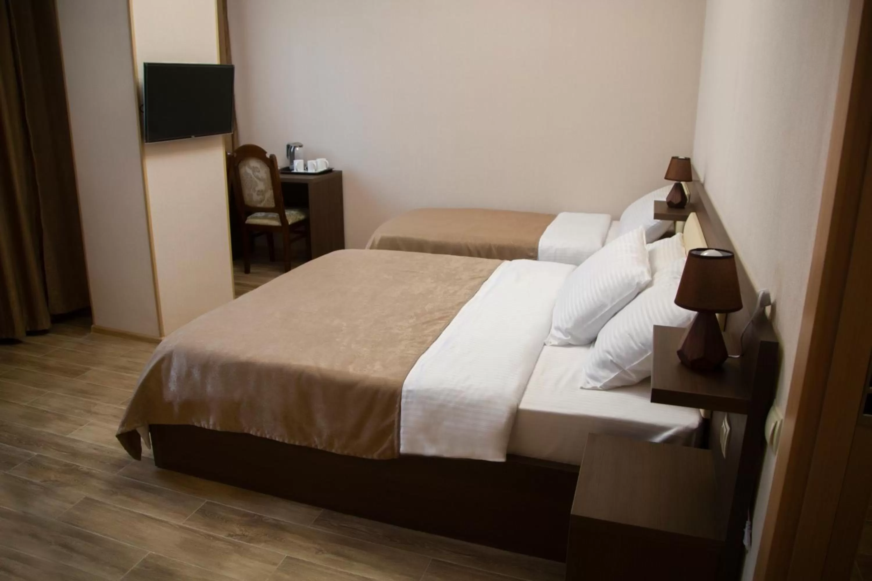 Living room, Bed in Family Hotel Triston