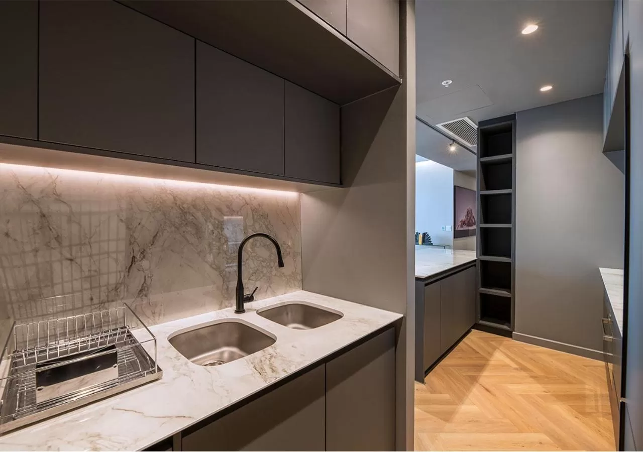 Kitchen or kitchenette in The Rockefeller Hotel by NEWMARK