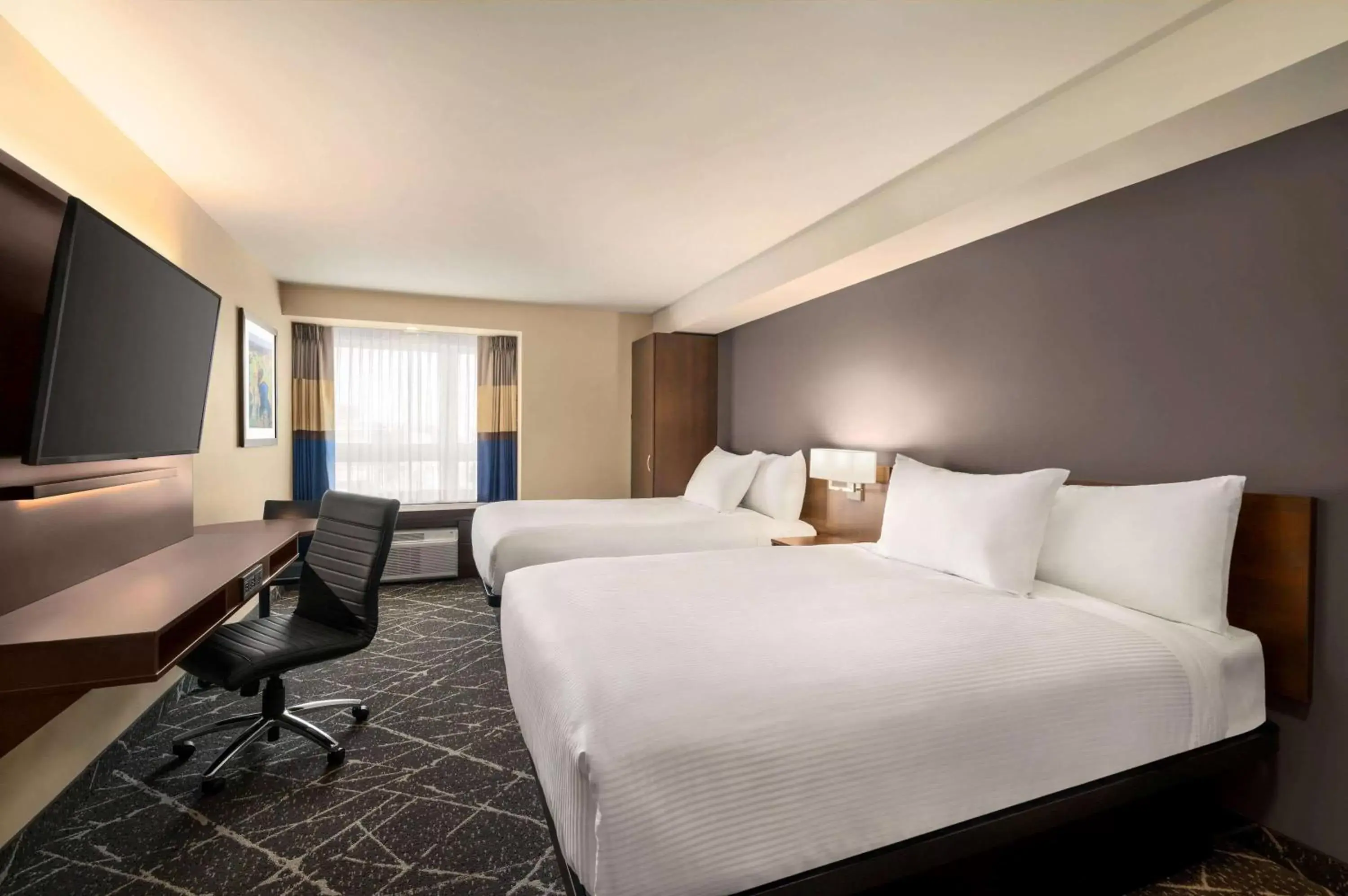 Photo of the whole room, Bed in Microtel Inn & Suites by Wyndham Aurora