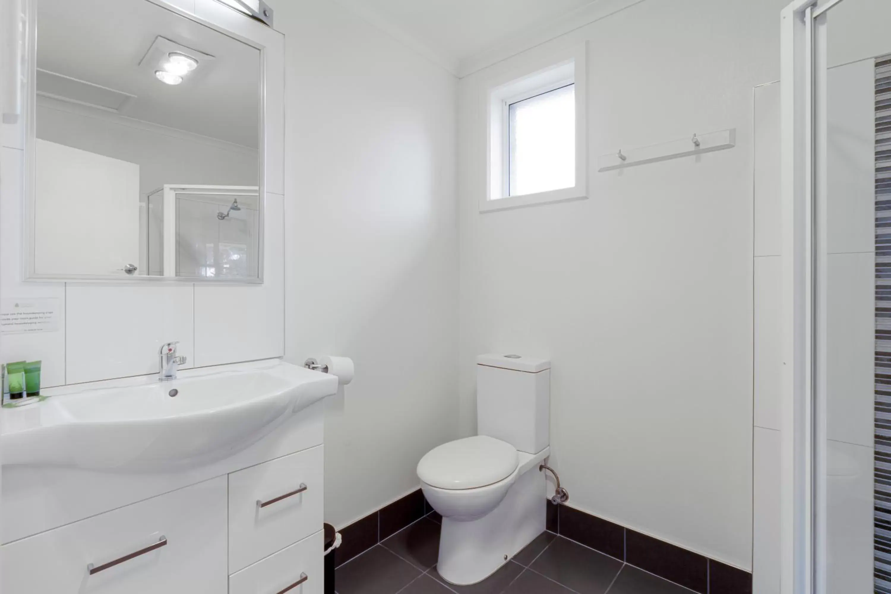 Toilet, Bathroom in Graham Apartments
