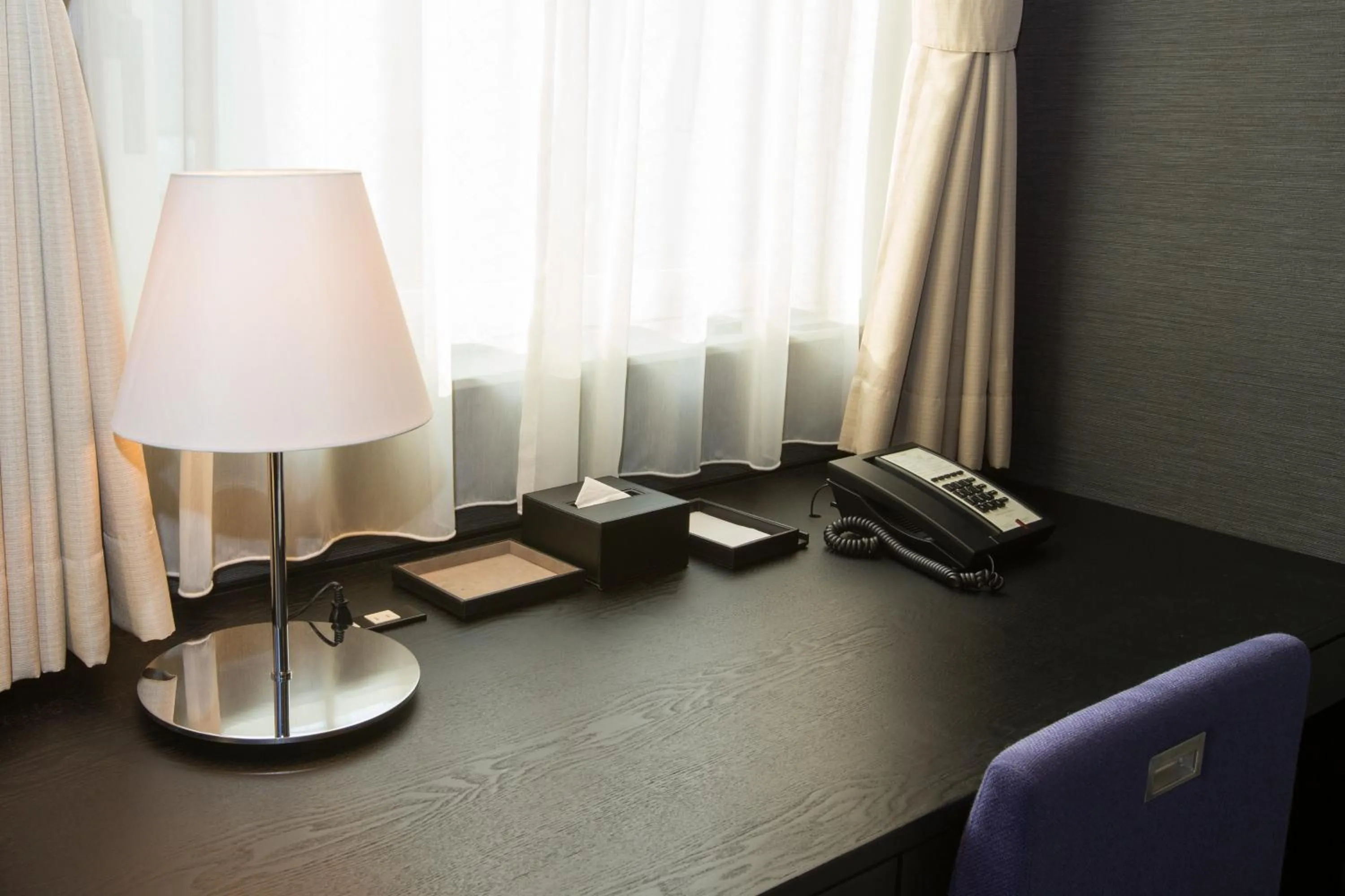 Seating area in The Gate Hotel Kaminarimon by Hulic