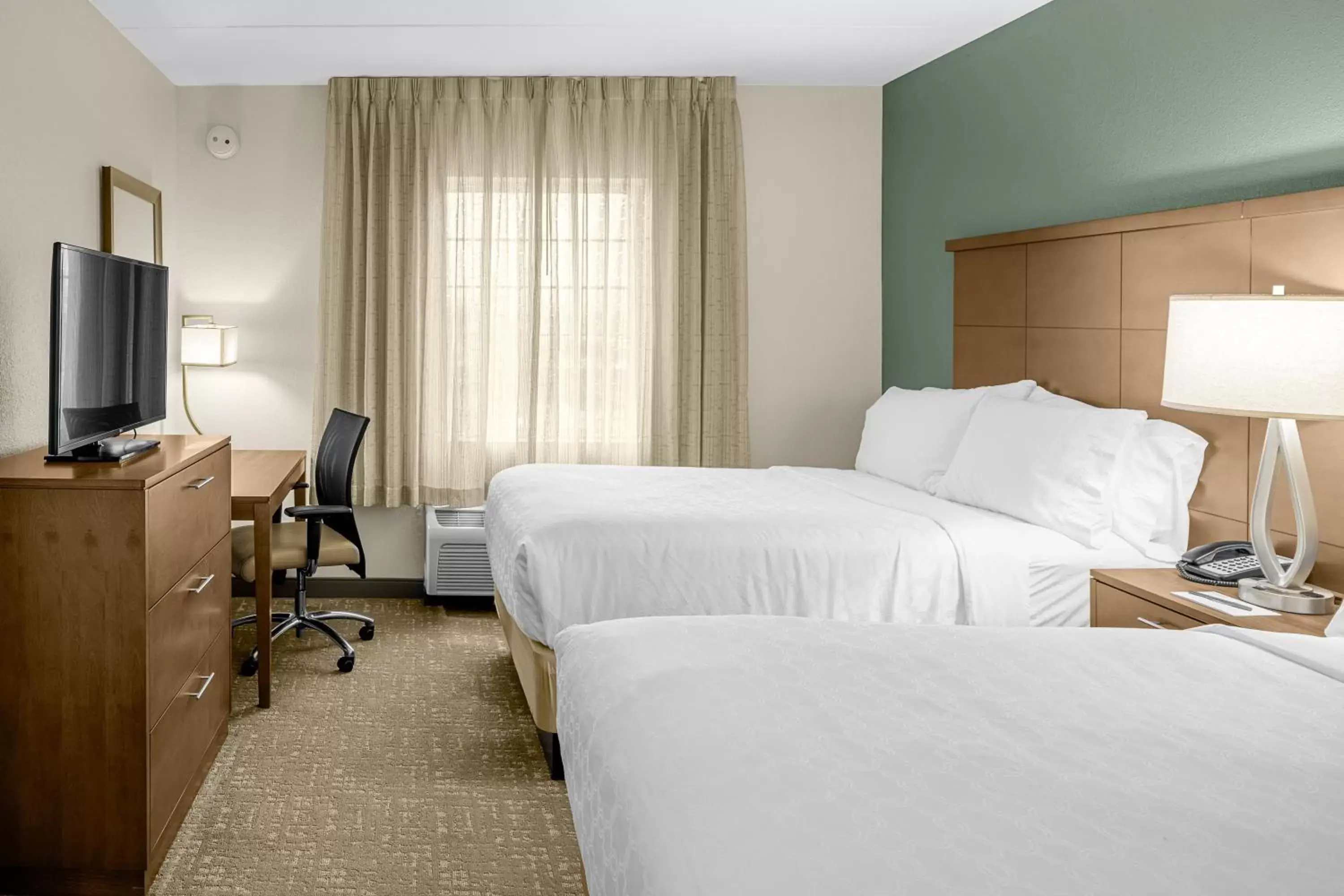 Photo of the whole room, Bed in Staybridge Suites Chattanooga-Hamilton Place, an IHG Hotel